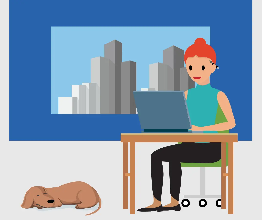 image of researcher seated at desk working on laptop with dog lying on the floor