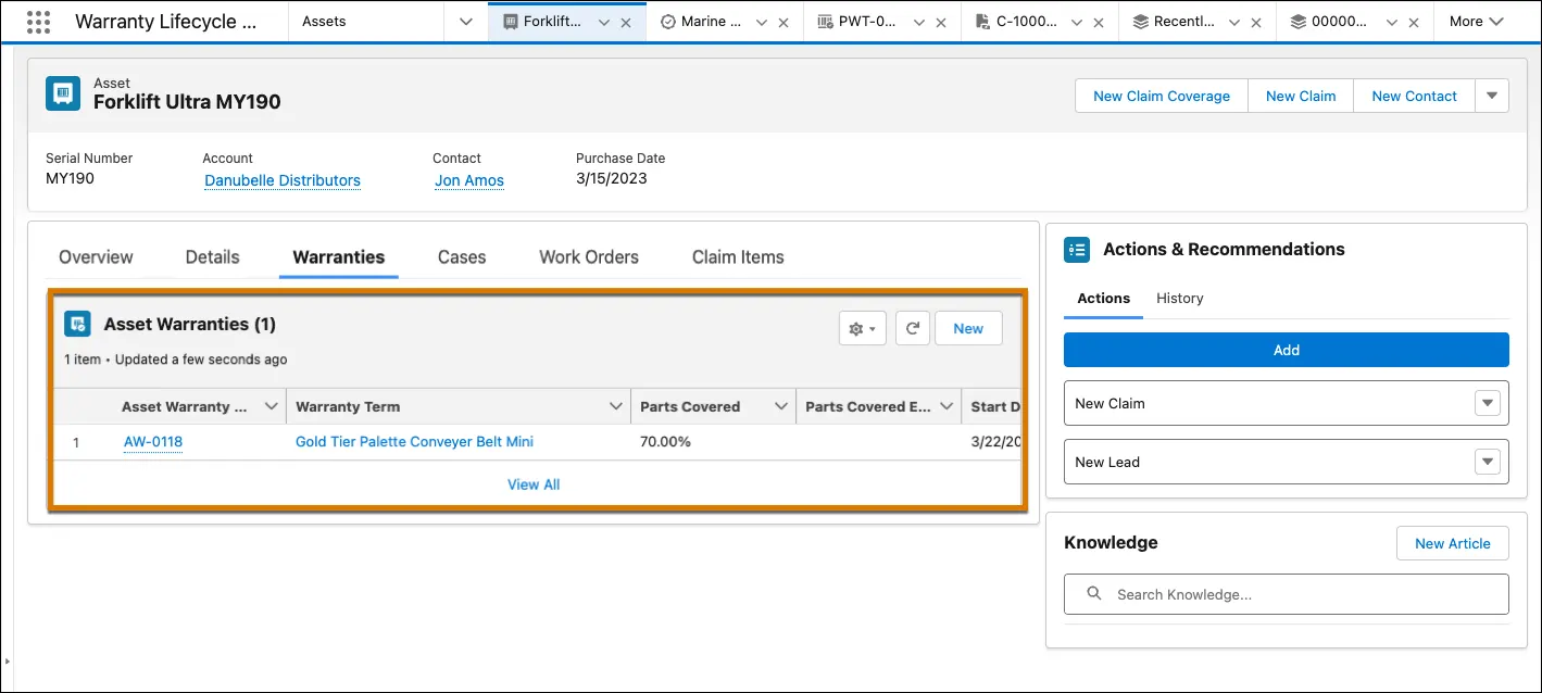 The Asset Warranties related list on the Forklift Ultra MY1905 asset record page in the Asset Service Console for Manufacturing.