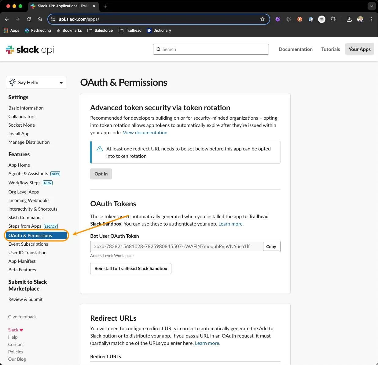 OAuth & Permissions page with the OAuth & Permissions section in the sidebar highlighted by an orange box and arrow.