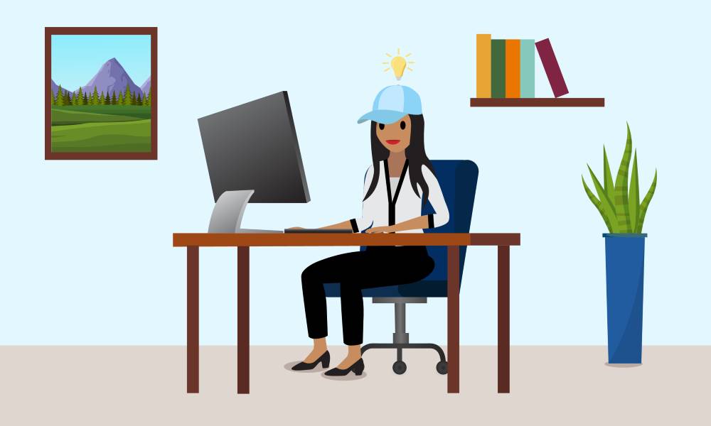 Leung sitting at a table wearing her thinking cap.