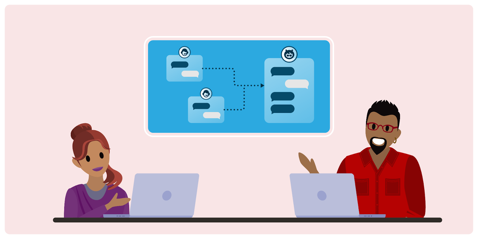 A supervisor and an admin discussing routing logic at a desk with their laptops
