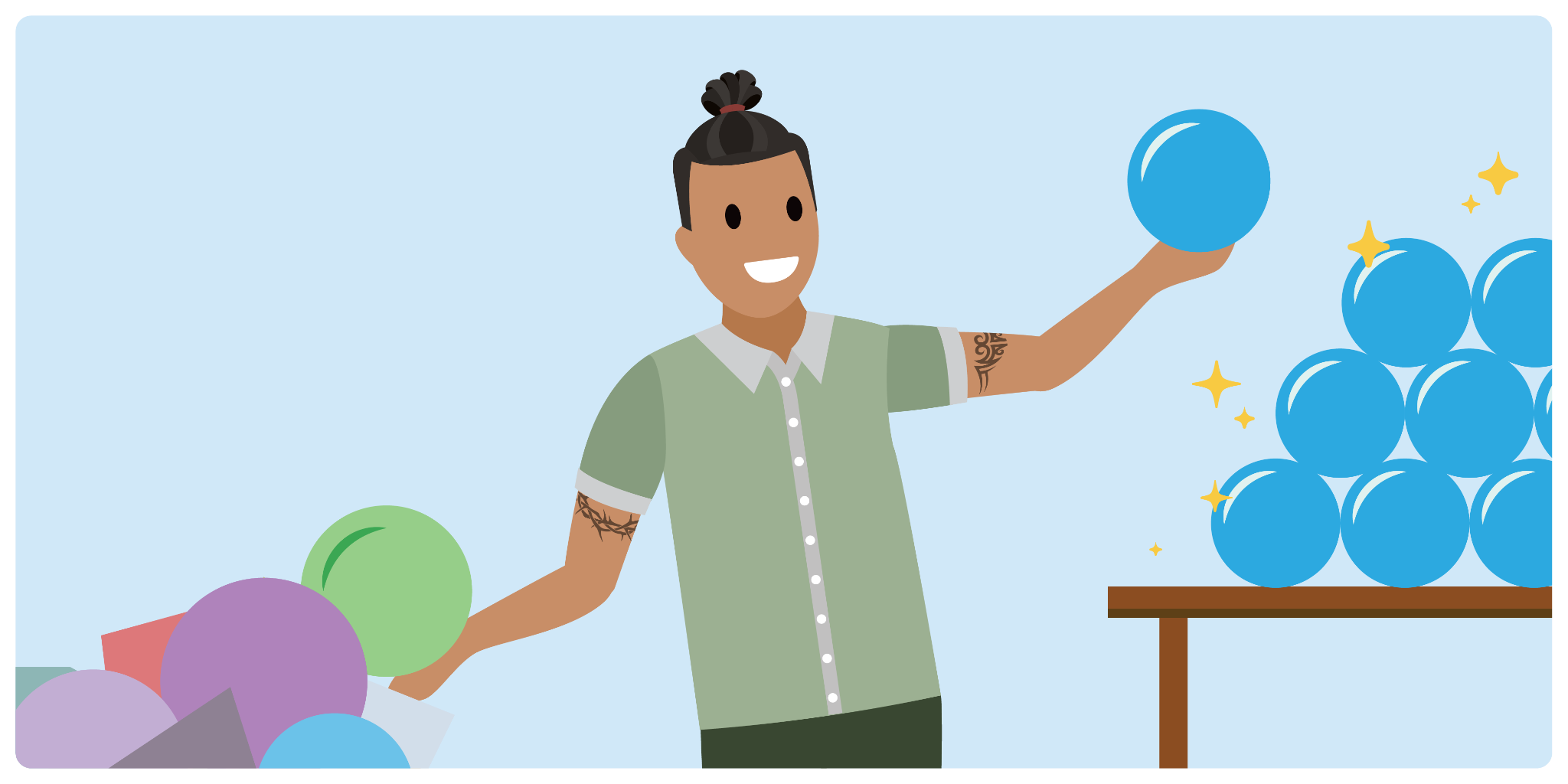 A Salesforce developer moving round objects from a pile on the floor to a table.