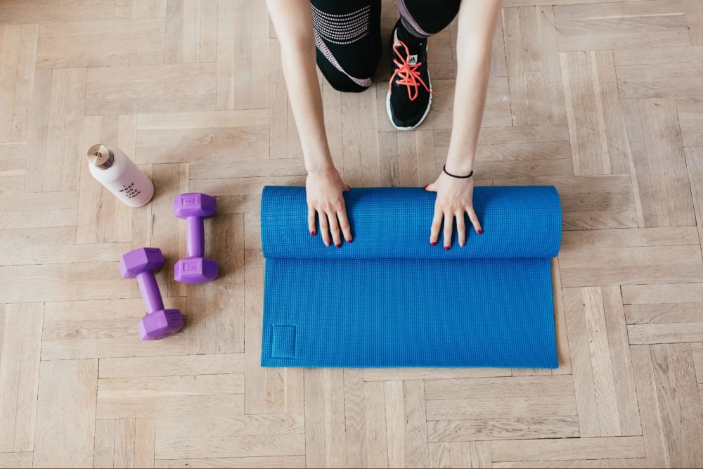 How to Roll Pilates and Yoga Mats to Keep Them Clean