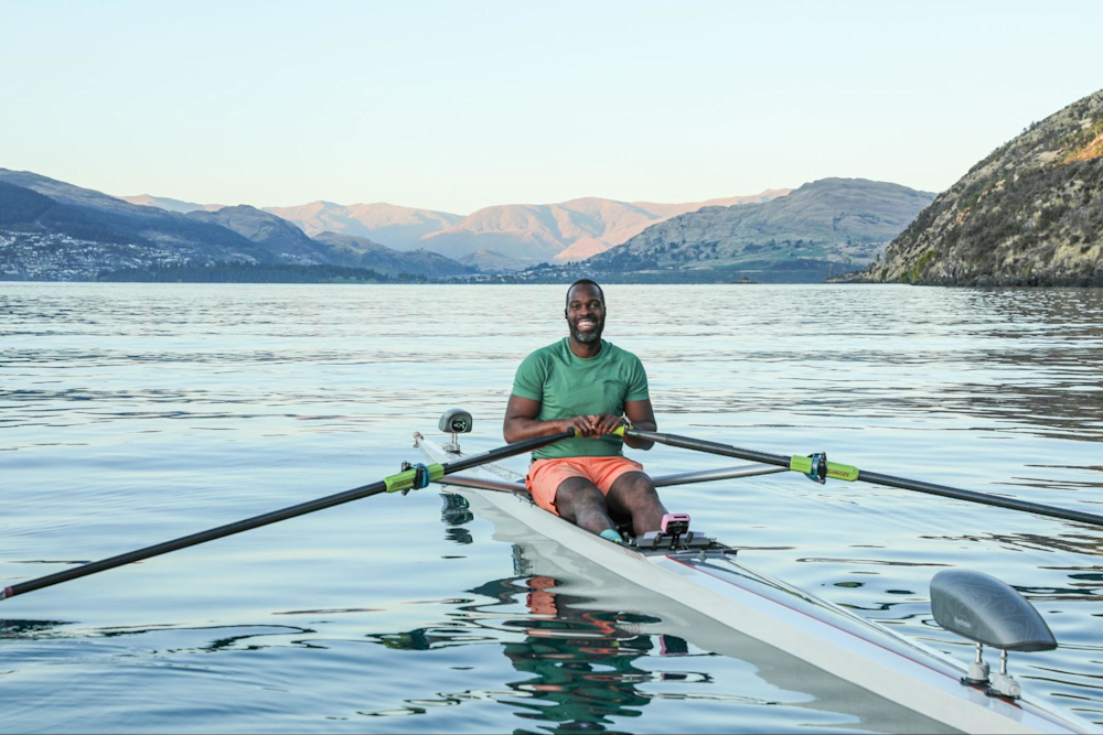 Hydrow Athlete leads an on-water rowing workout for the Hydrow rowing machine, which is included in a Hydrow membership.