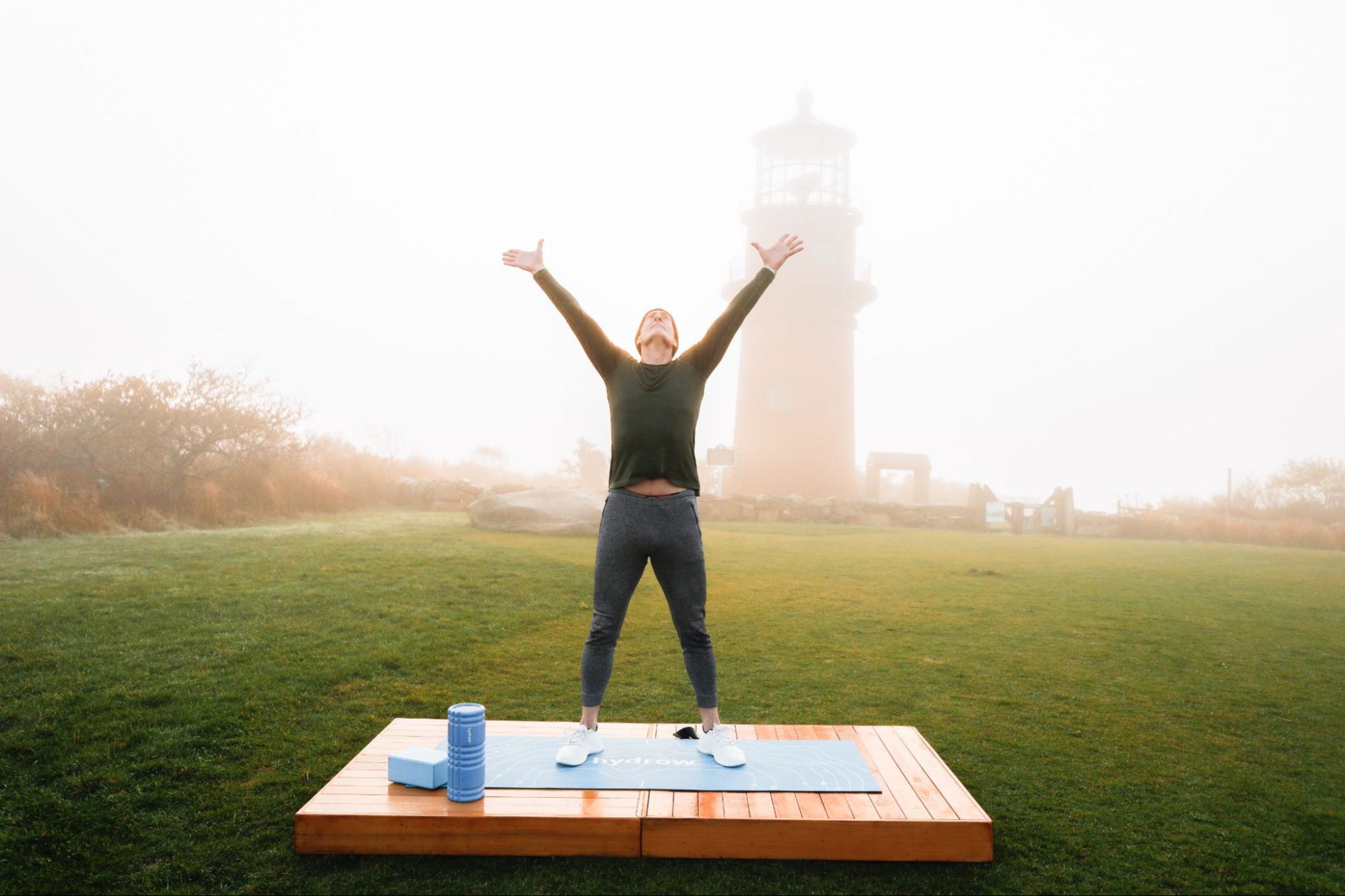 Man mixes up his exercise routine by doing yoga.