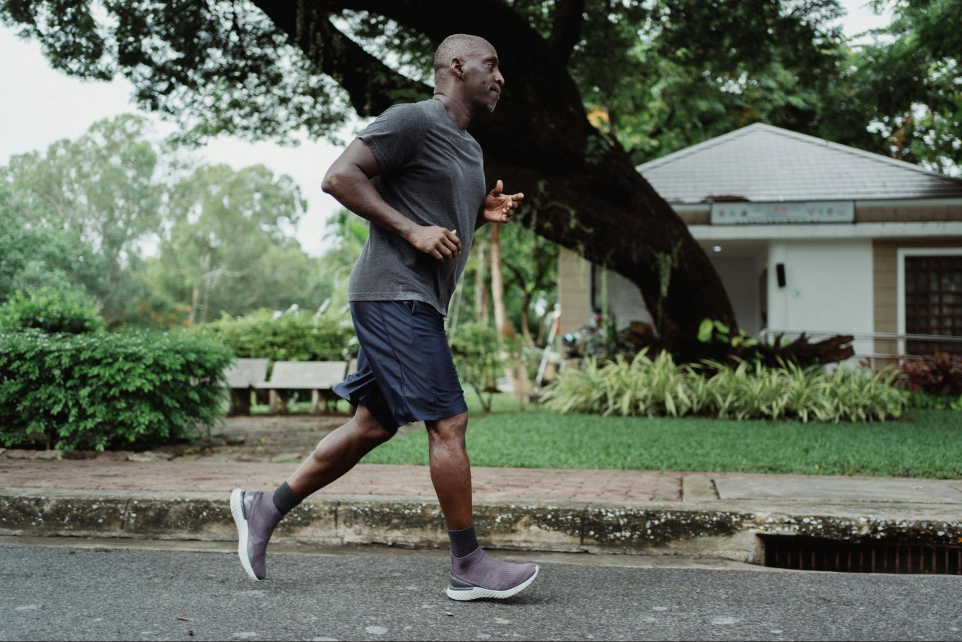 Man goes for a run to benefit his heart health.
