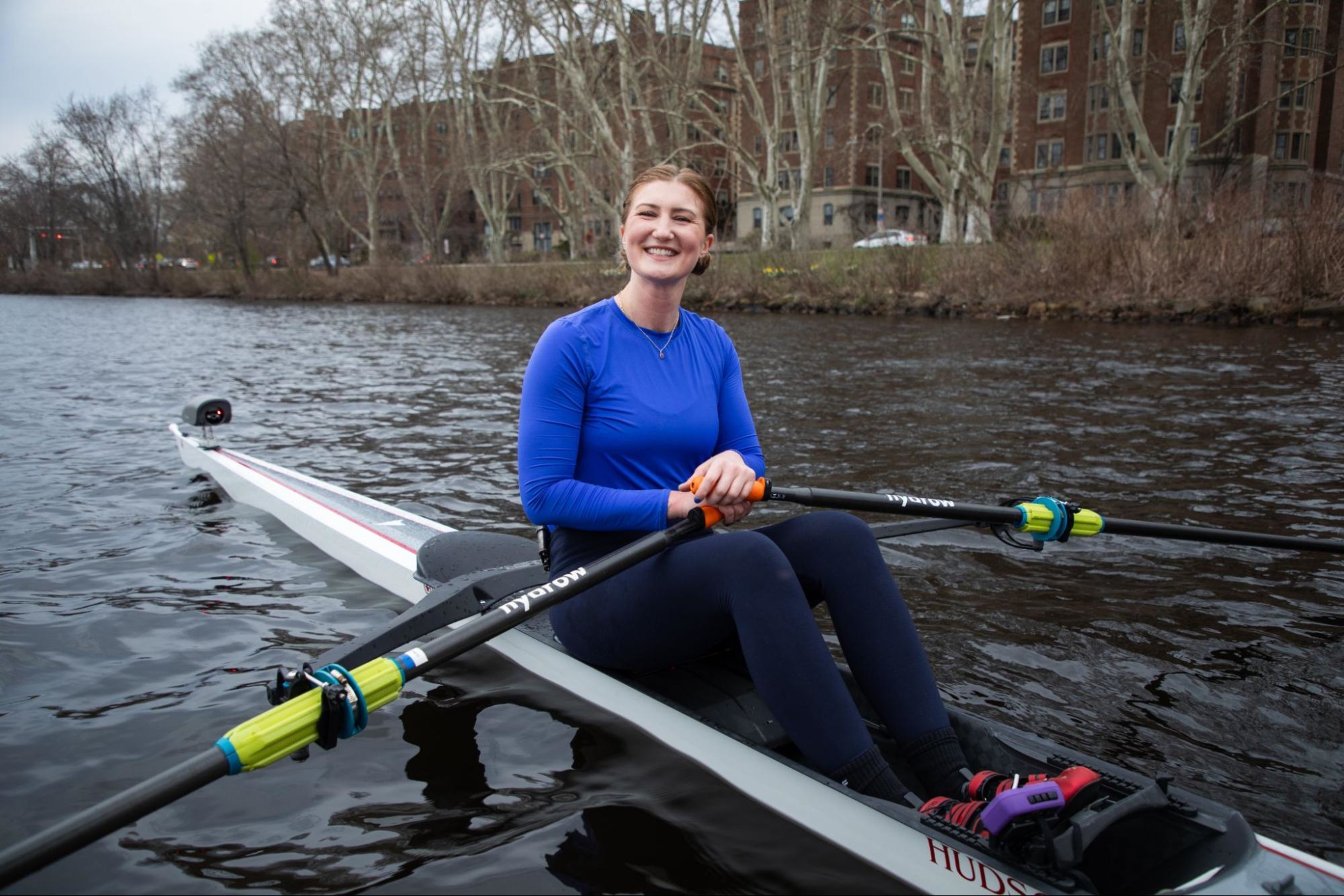 Woman does a full-body rowing workout with Hydrow.