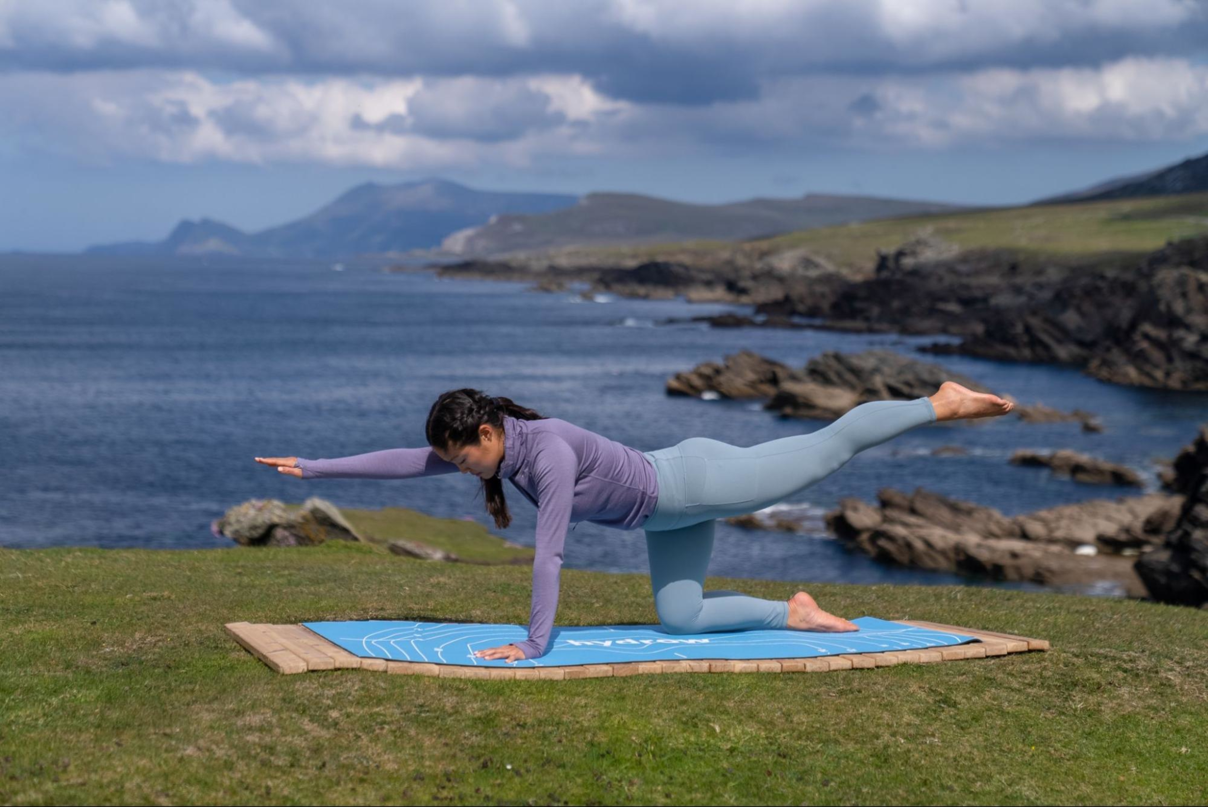 Woman does a Pilates workout after learning how much exercise to do per week.