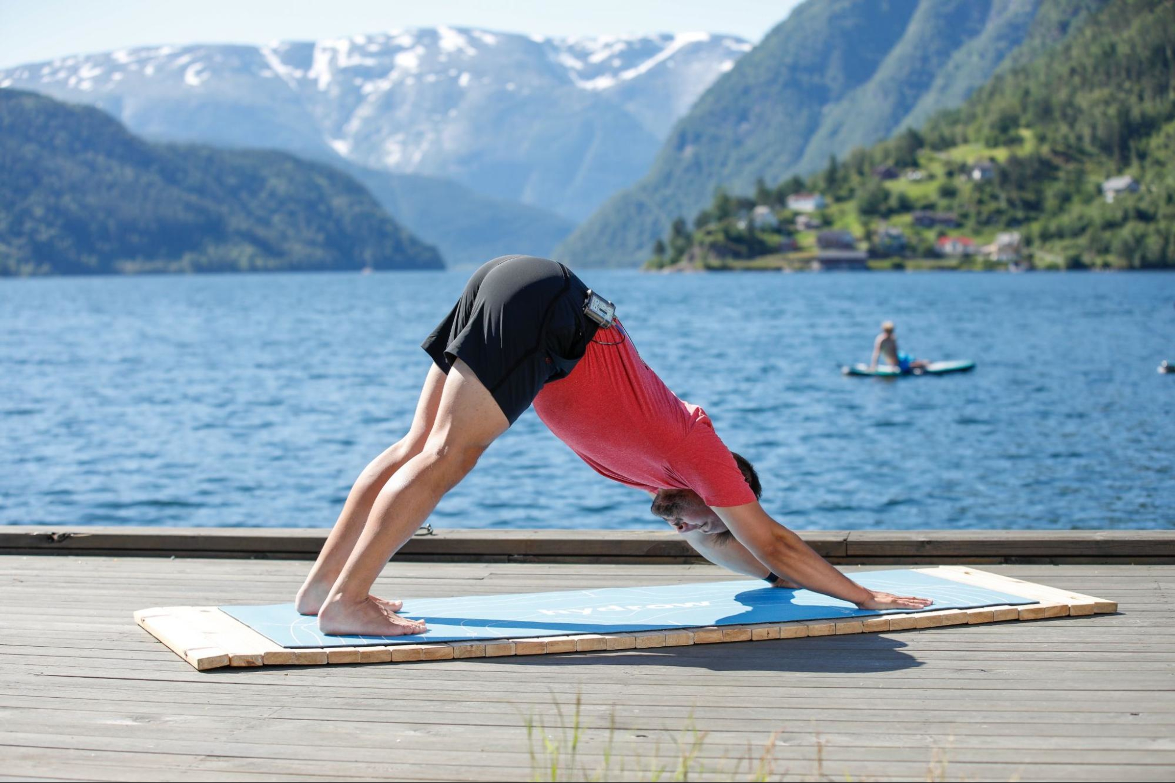 Man does a yoga workout after deciding to work out every day.