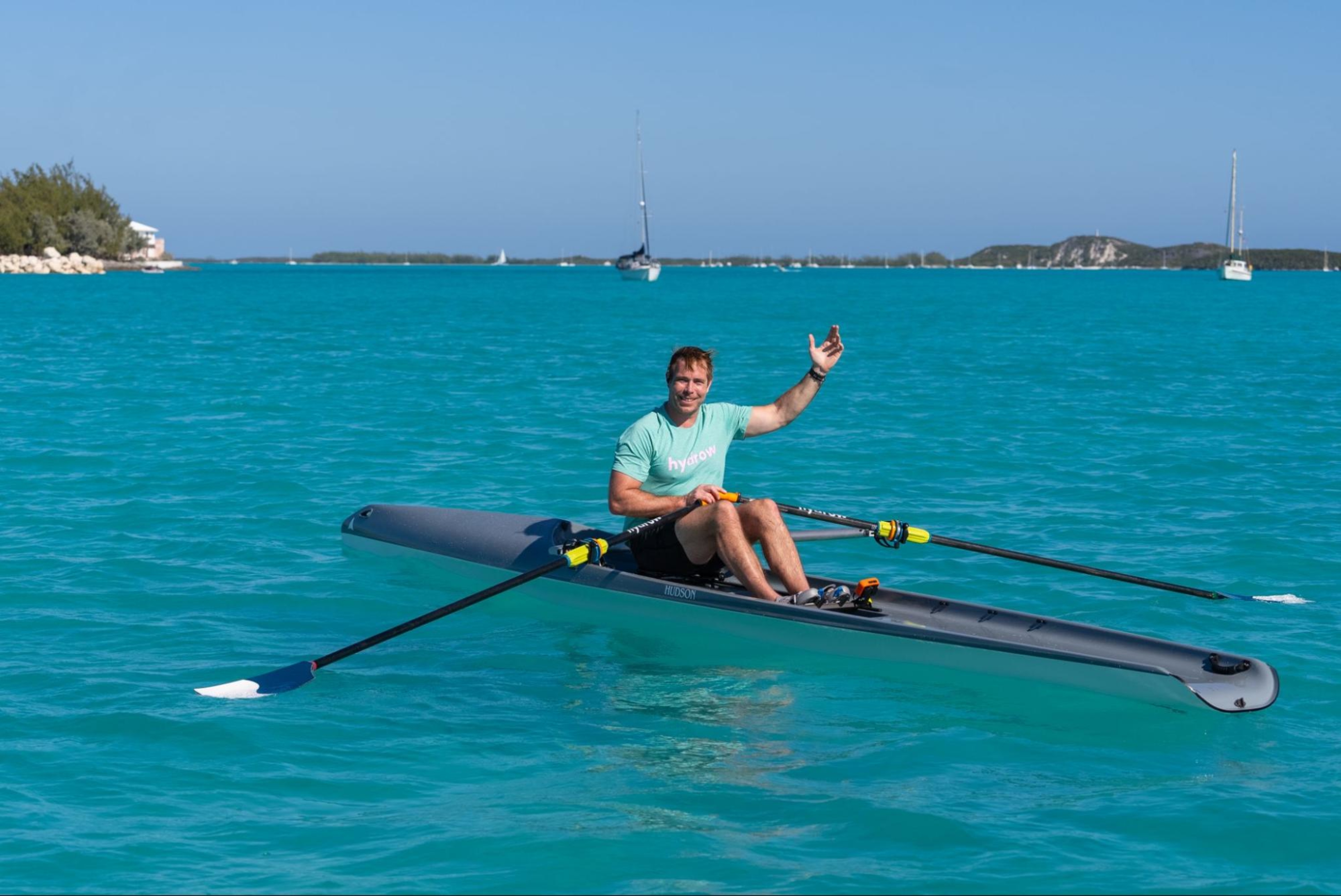 Hydrow Athlete leads a rowing workout from the Bahamas, which is included in the cost of a Hydrow membership.