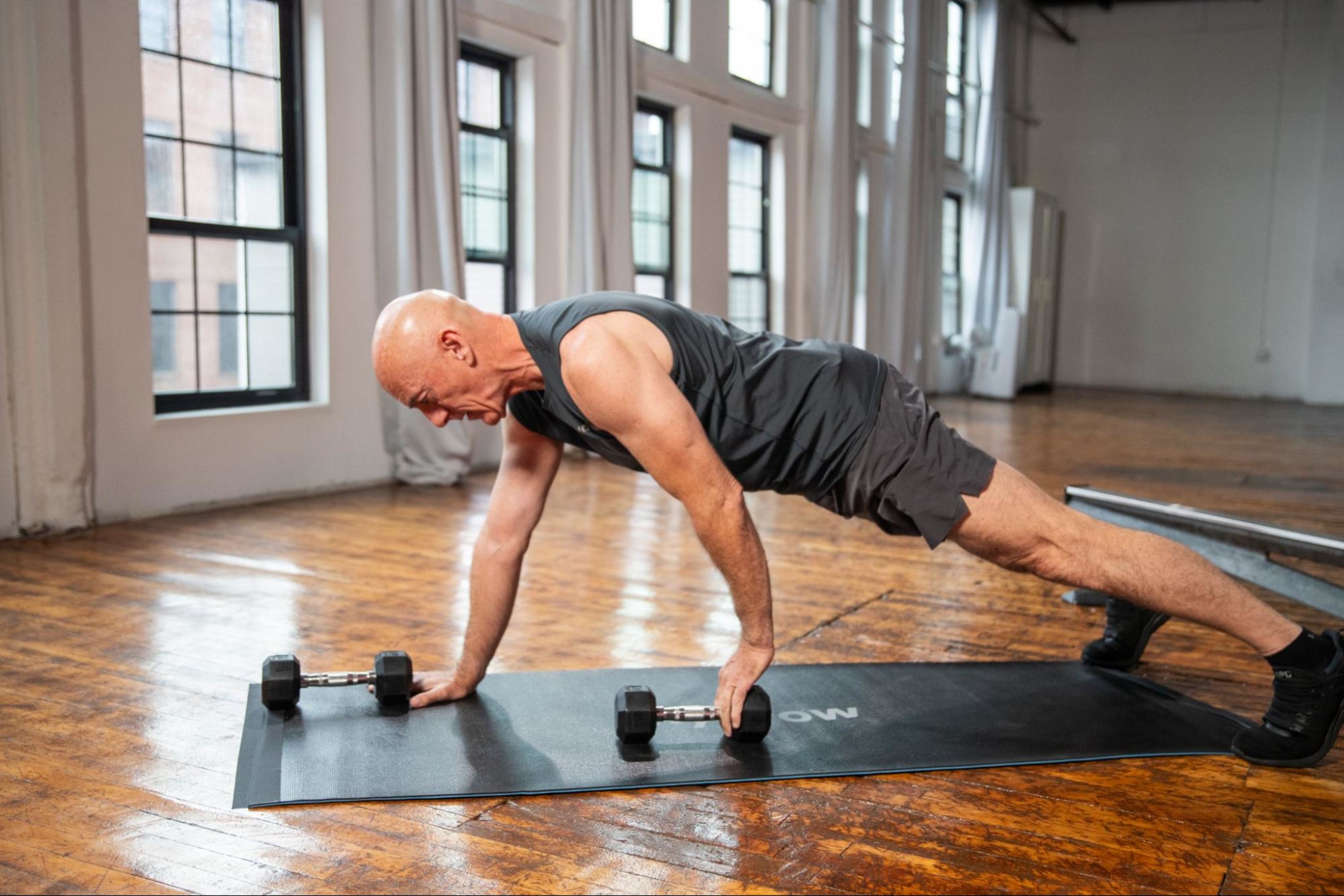 Man does a strength training workout.