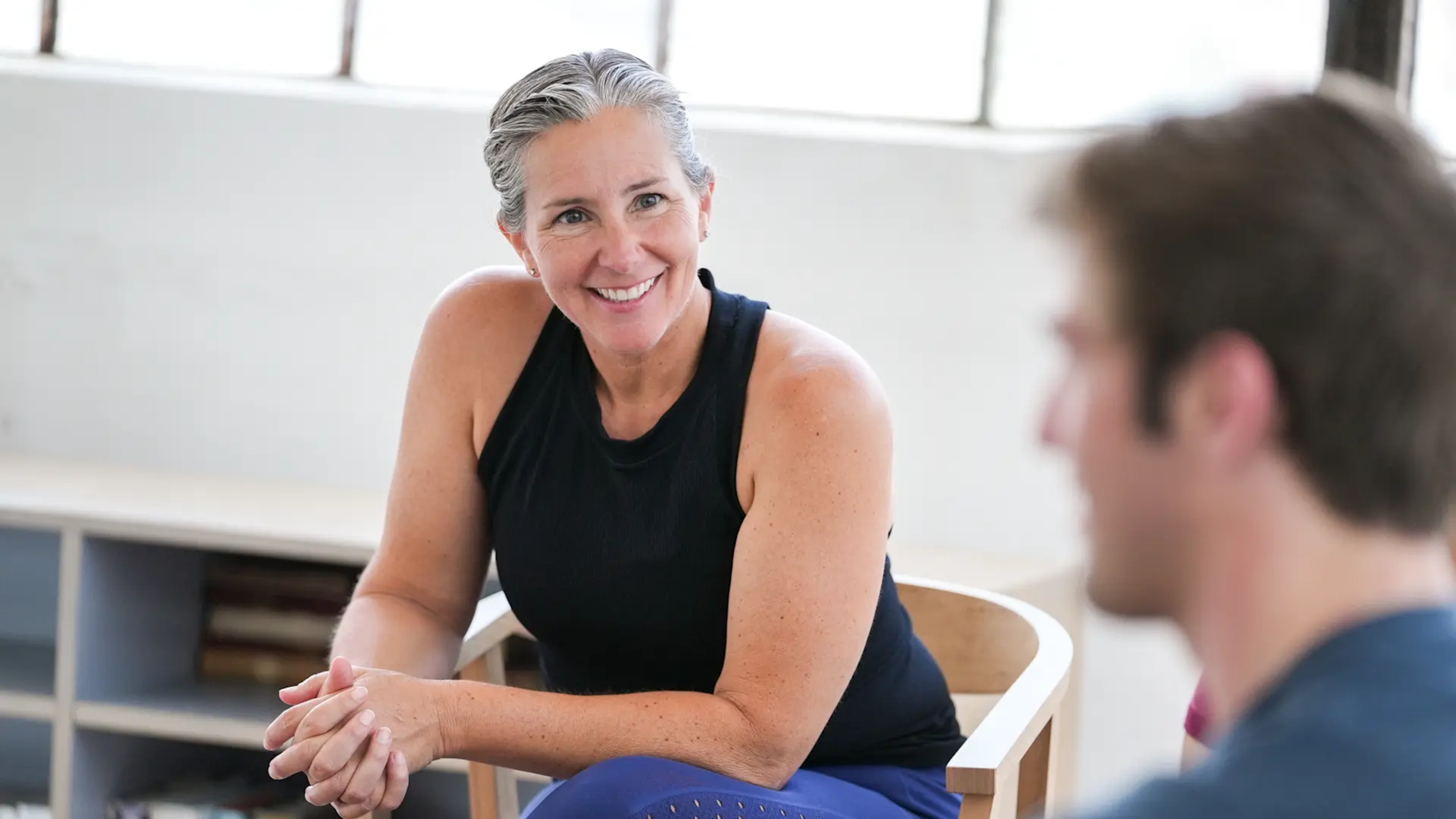 Megan Hanewald, Hydrow's lead personal coach, does a coaching session with a Hydrow member.