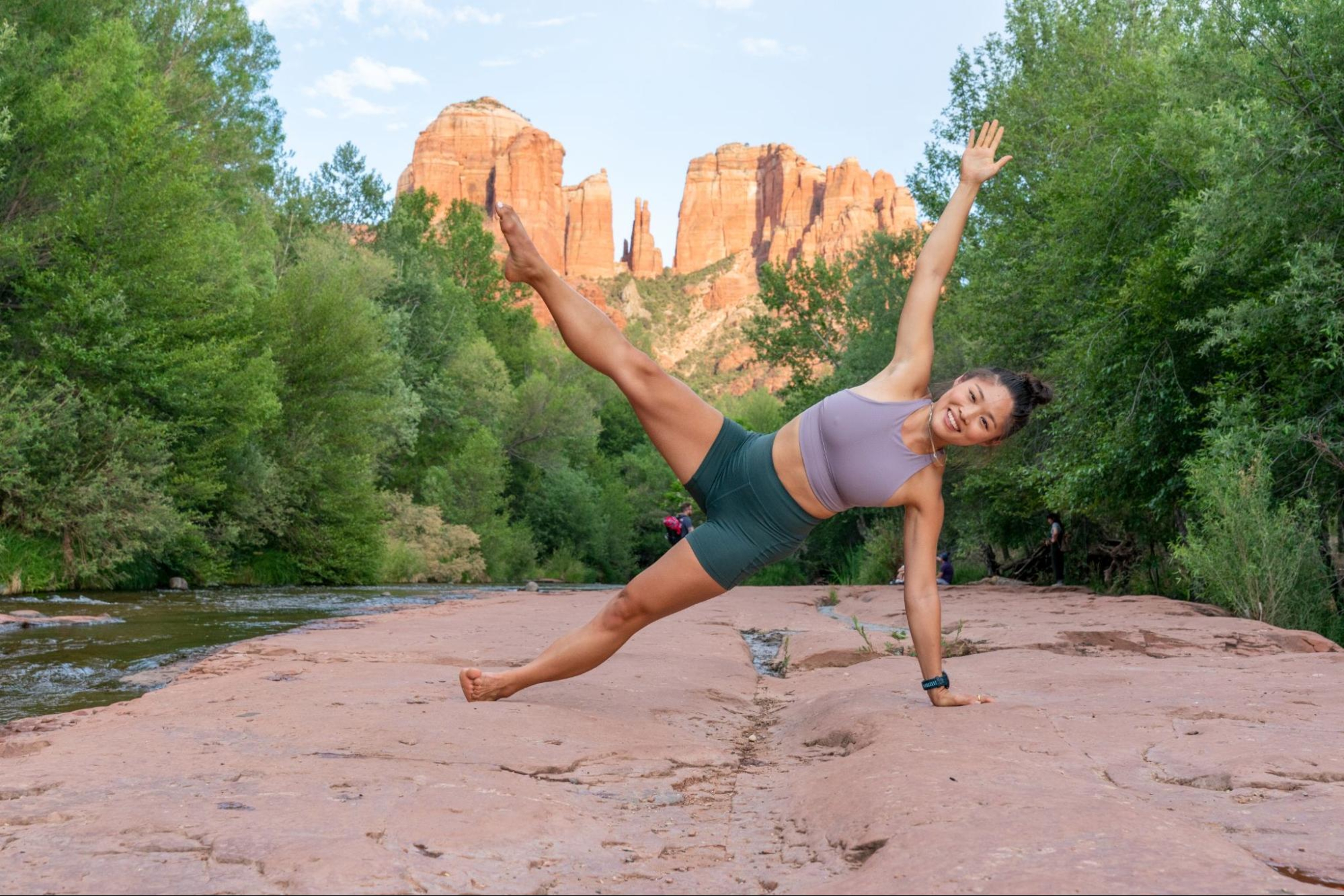 Woman uses Pilates as strength training outdoors.