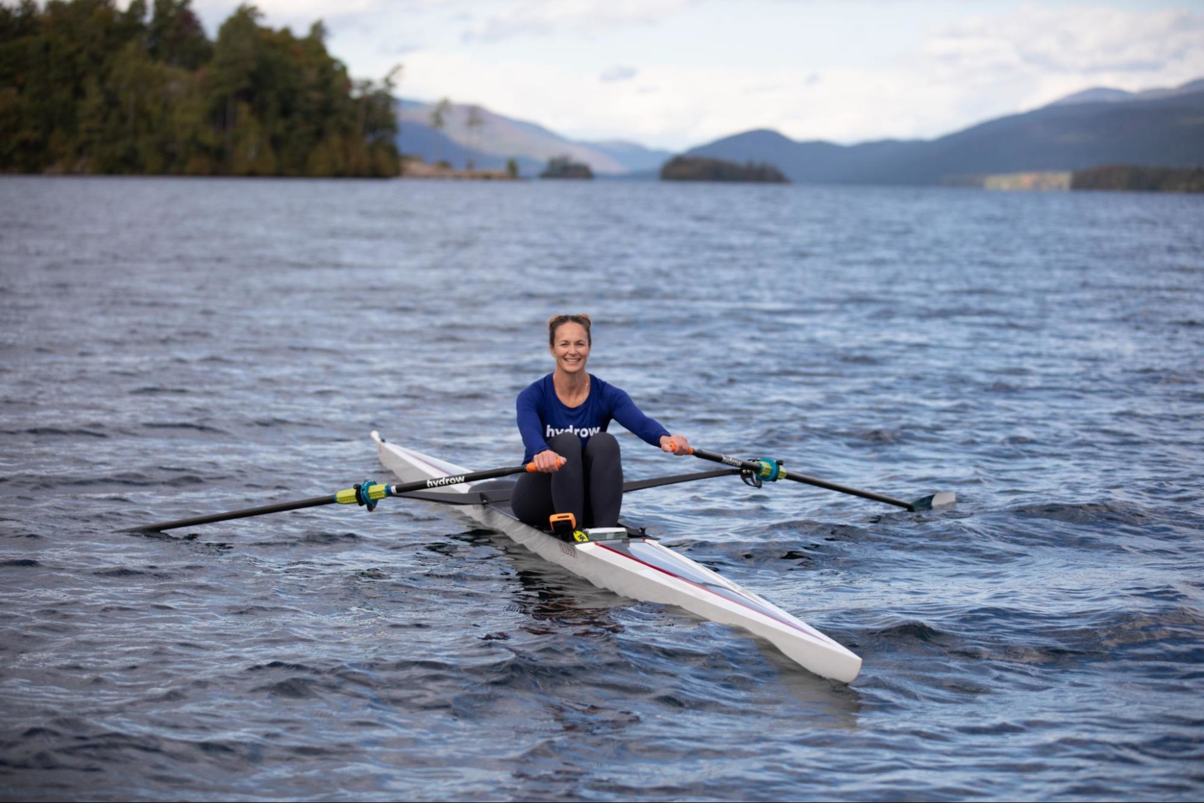 Hydrow Athlete Buffy leads a rowing workout on Lake George.