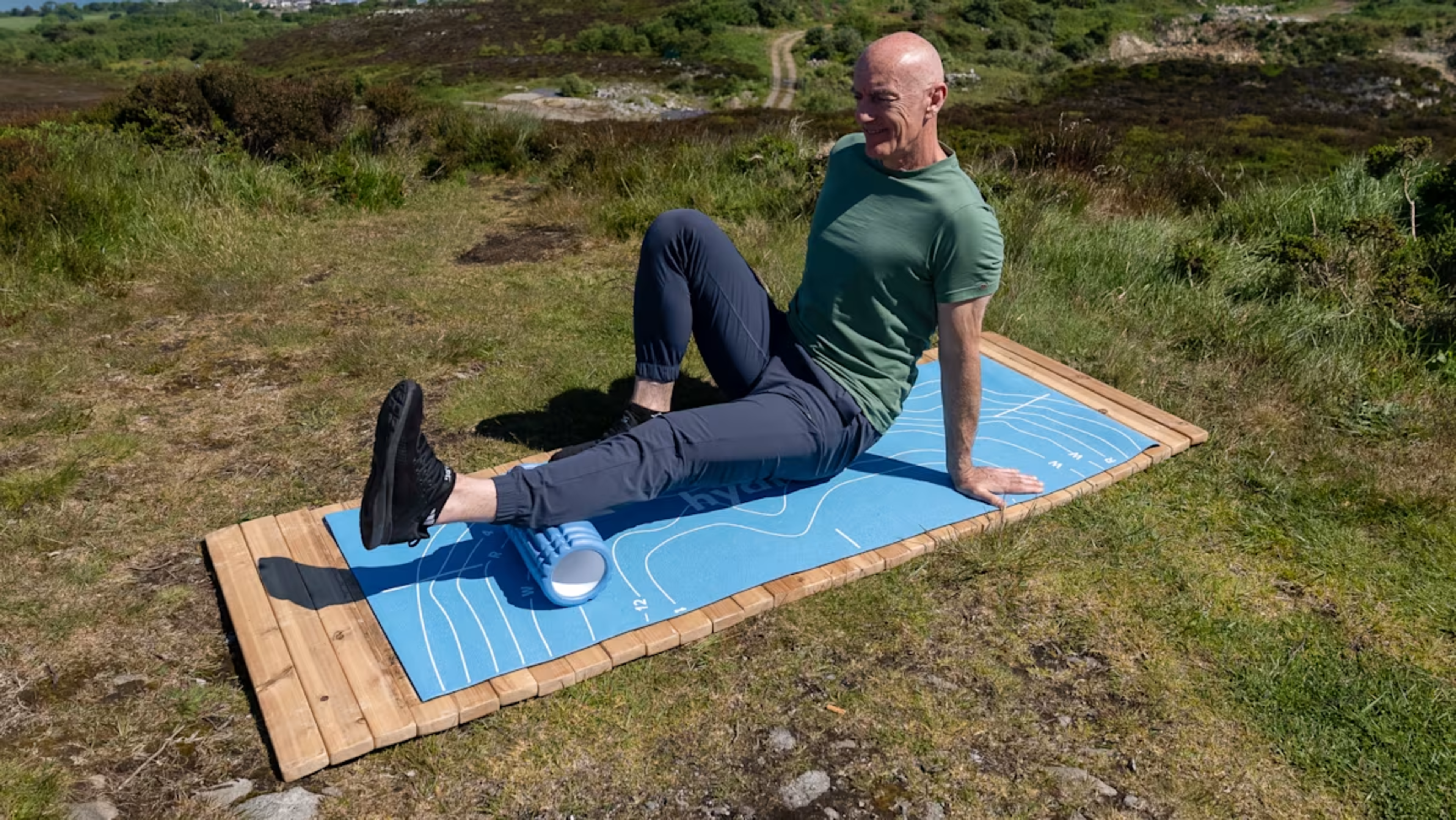 Hydrow Athlete Pete demonstrates how foam rollers work.