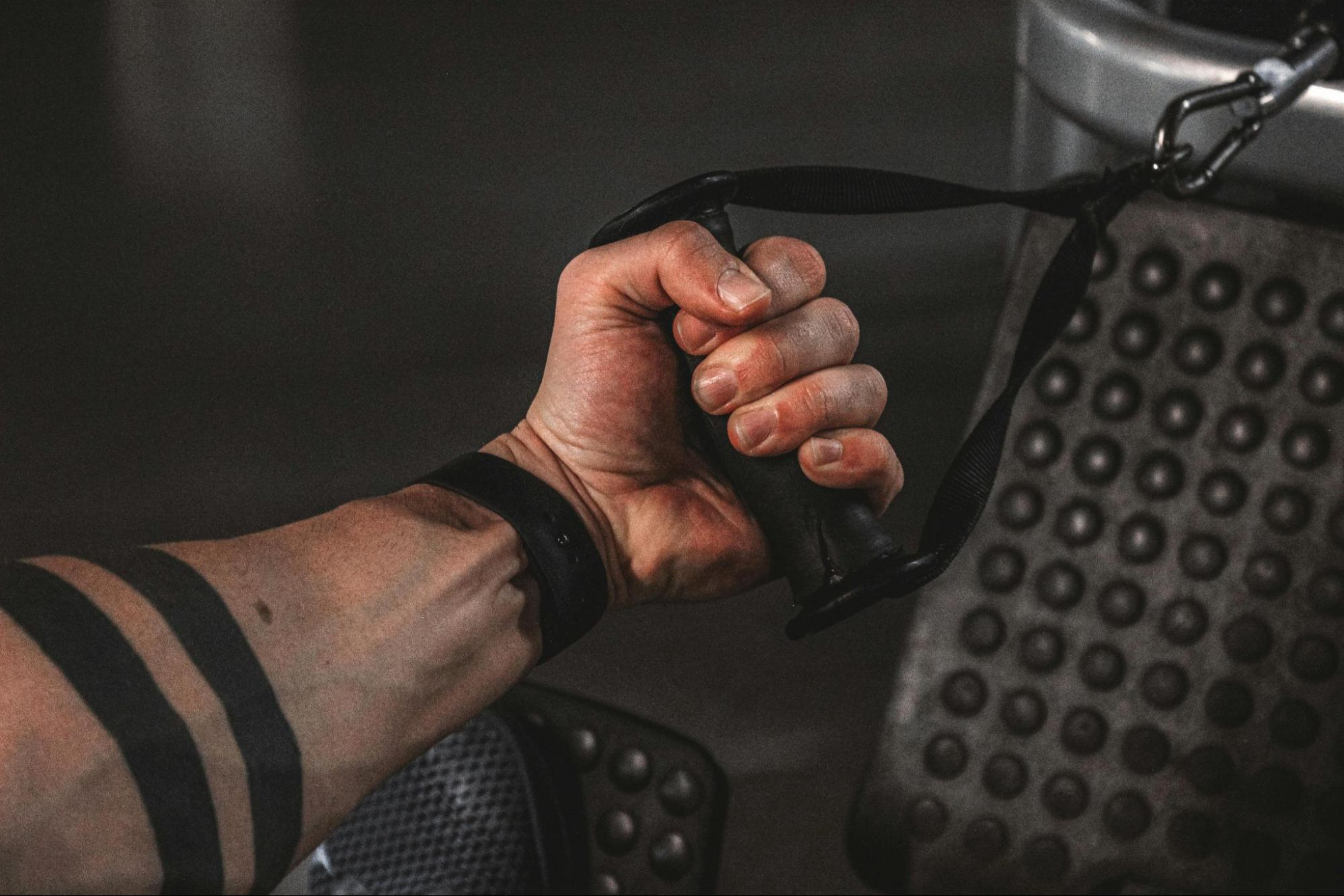 Man does exercises to build forearm muscle.
