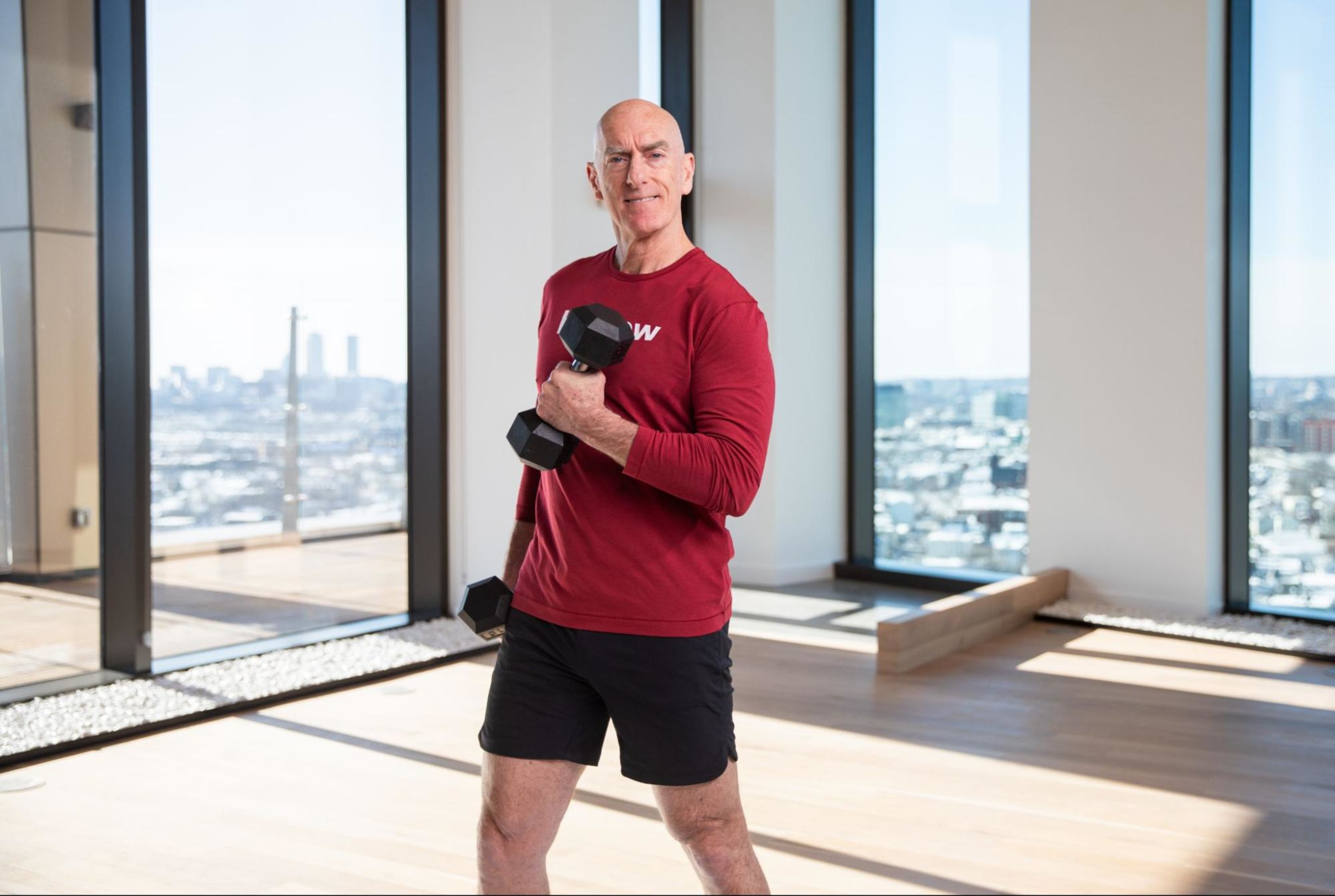 Hydrow Athlete Pete shares tips for building arm muscle by demonstrating an arm workout using a dumbbell.