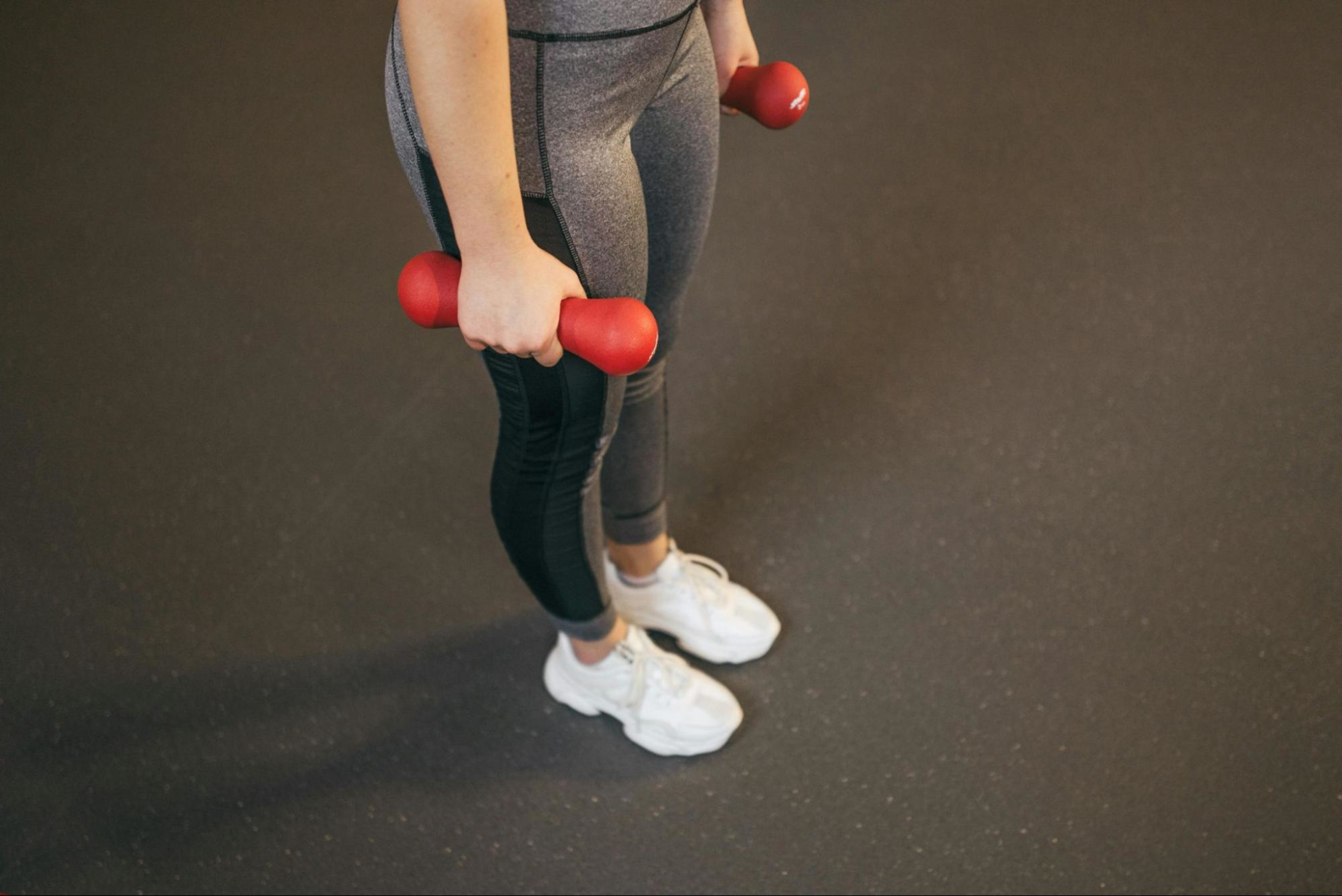 Woman does a strength training workout to lower her blood pressure.