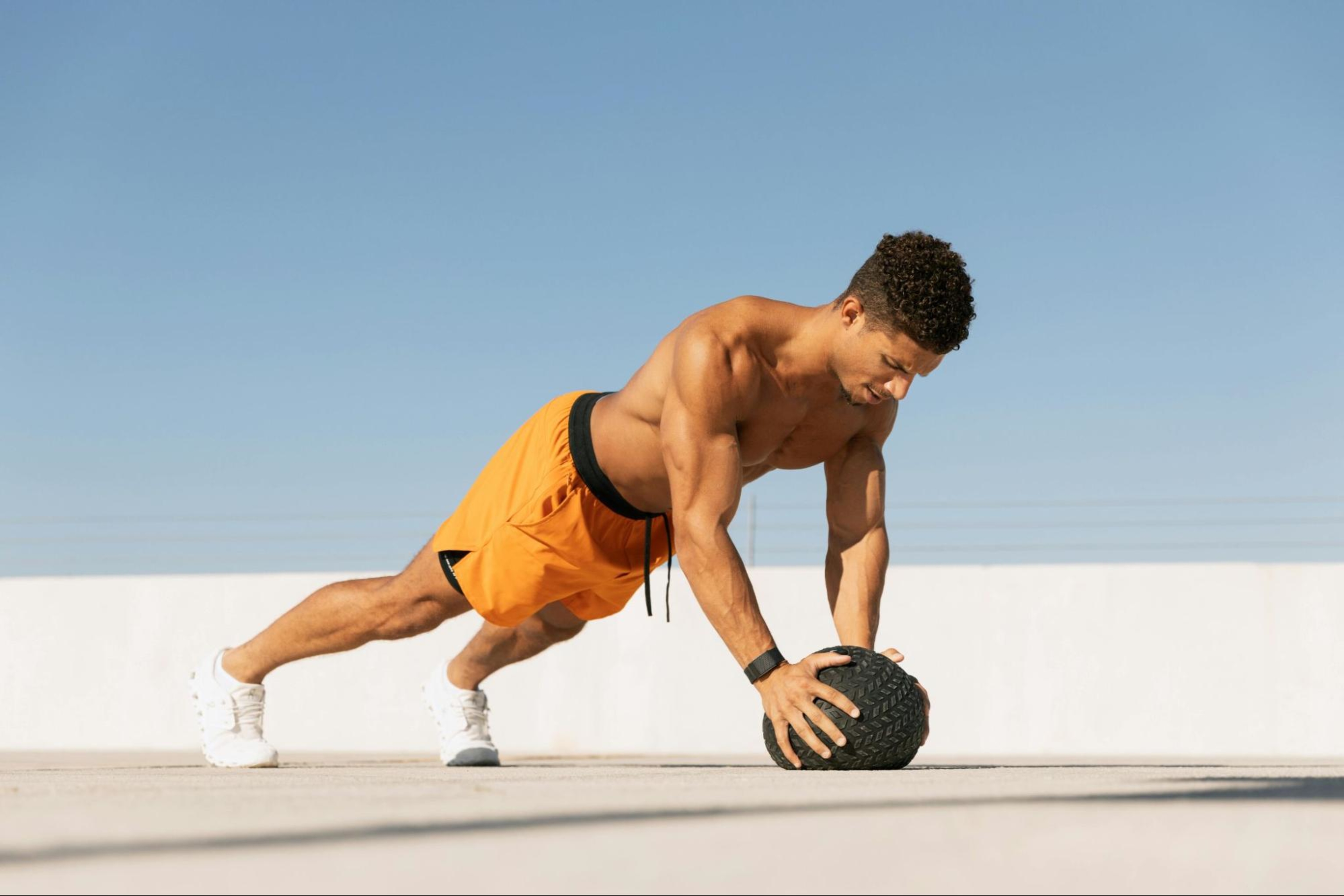 Man does planks after learning how much protein you need to gain muscle.
