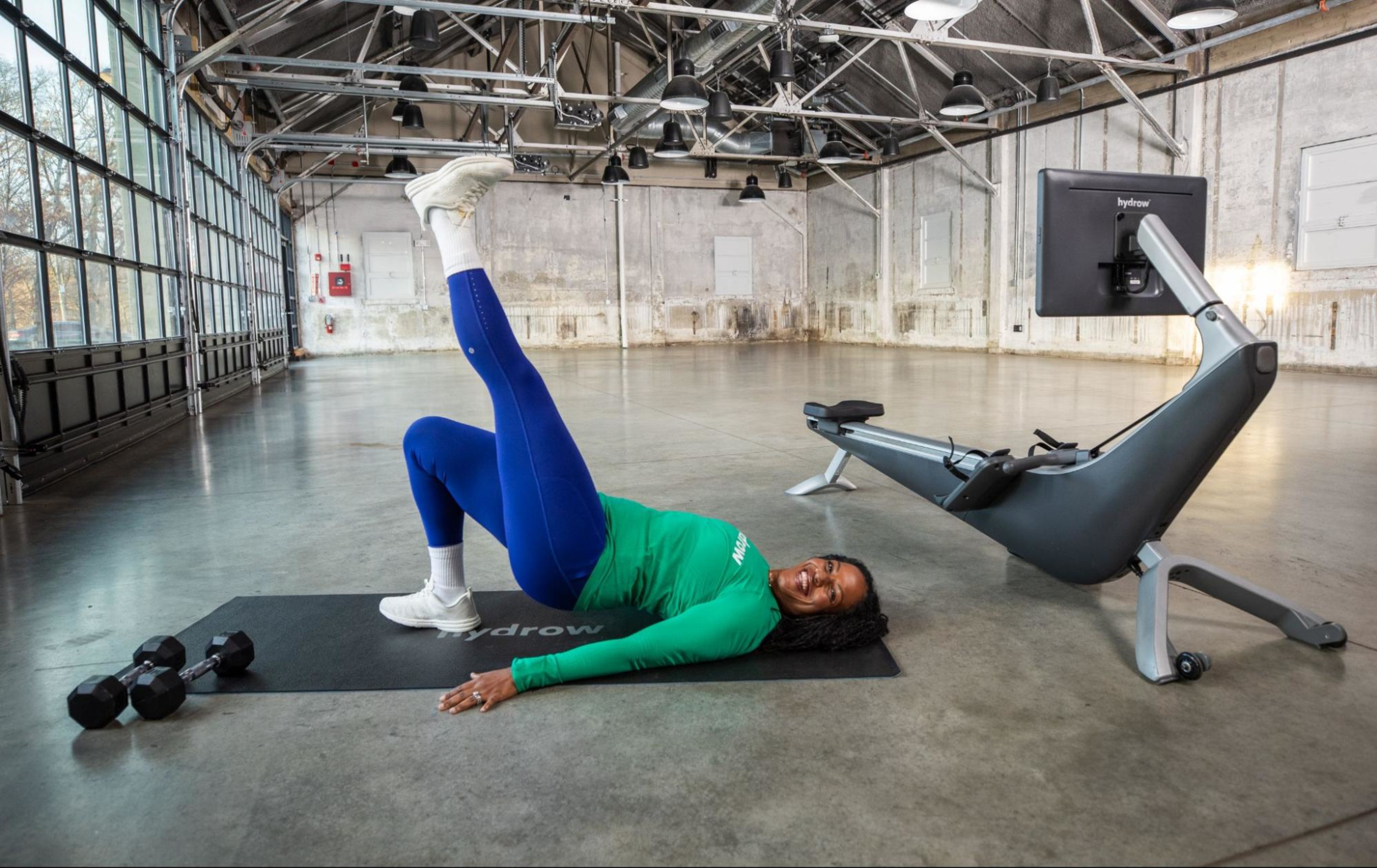 Hydrow Athlete Rina leads a postpartum strength training routine.