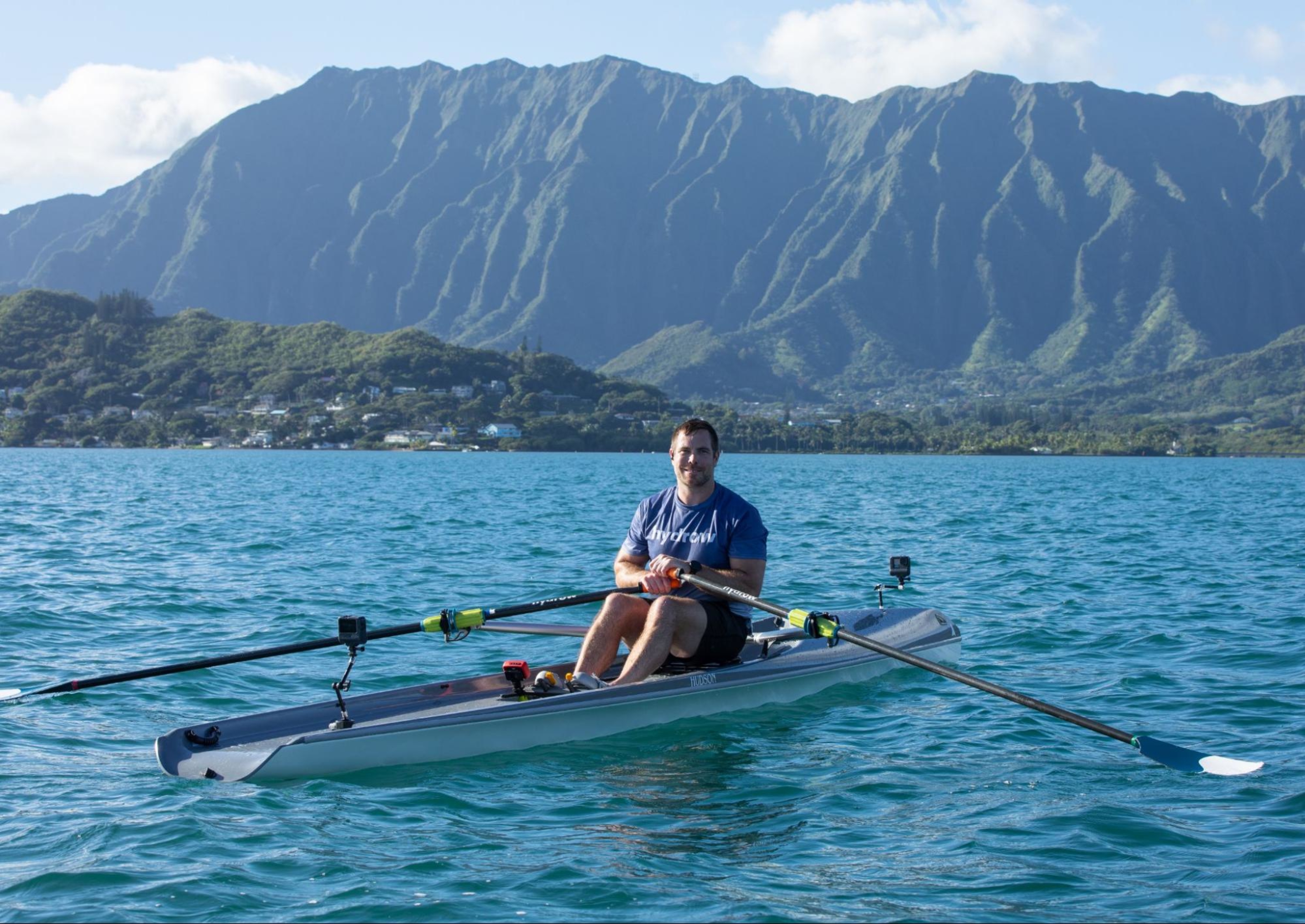 Hydrow Athlete James leads a rowing workout from Hawaii, available with a Hydrow membership.