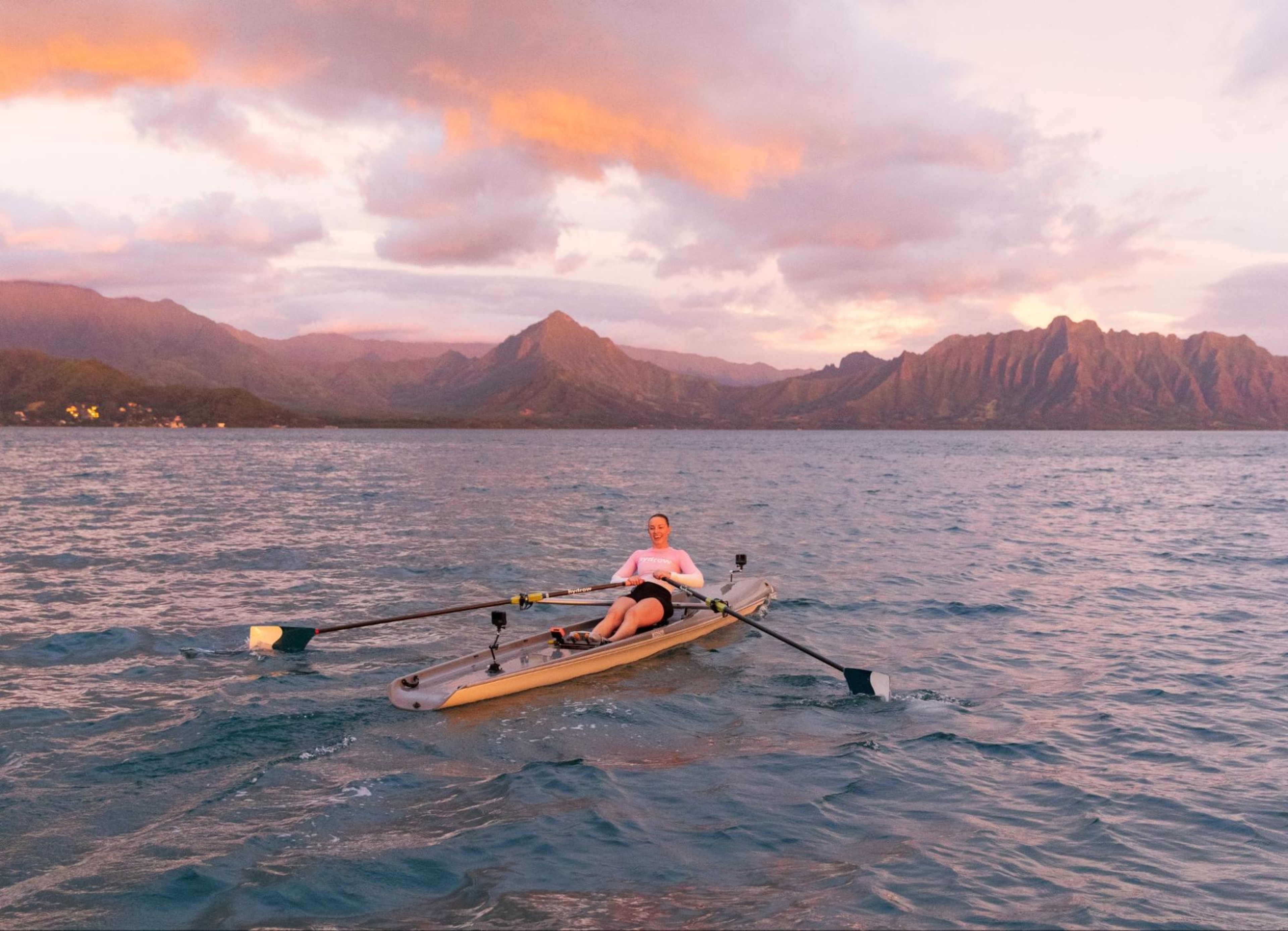 A Hydrow Athlete leads an on-water workout in Hawaii to demonstrate the types of workouts included with a Hydrow membership.