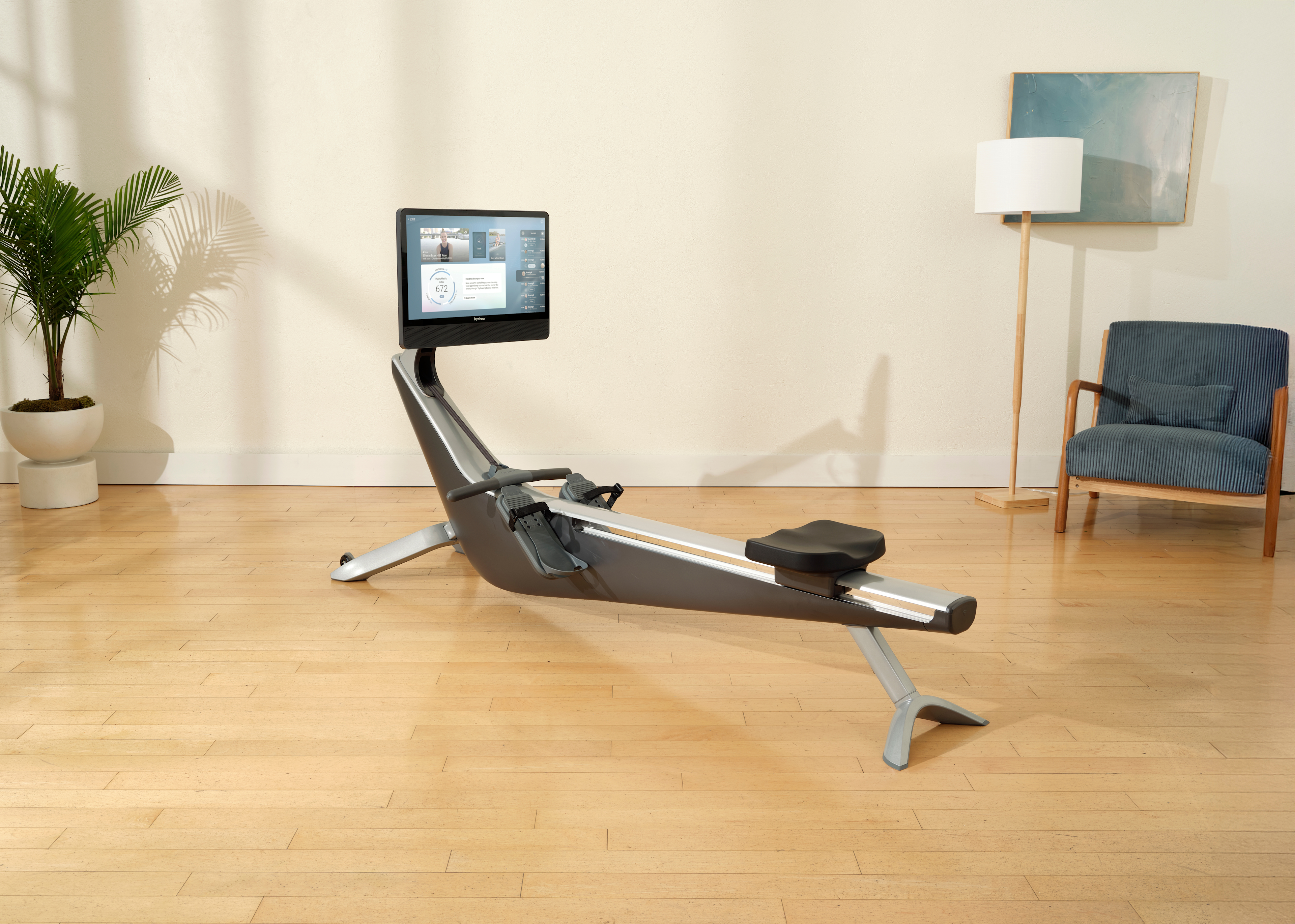 A Hydrow rowing machine displaying its HydroMetrics intelligent training technology.