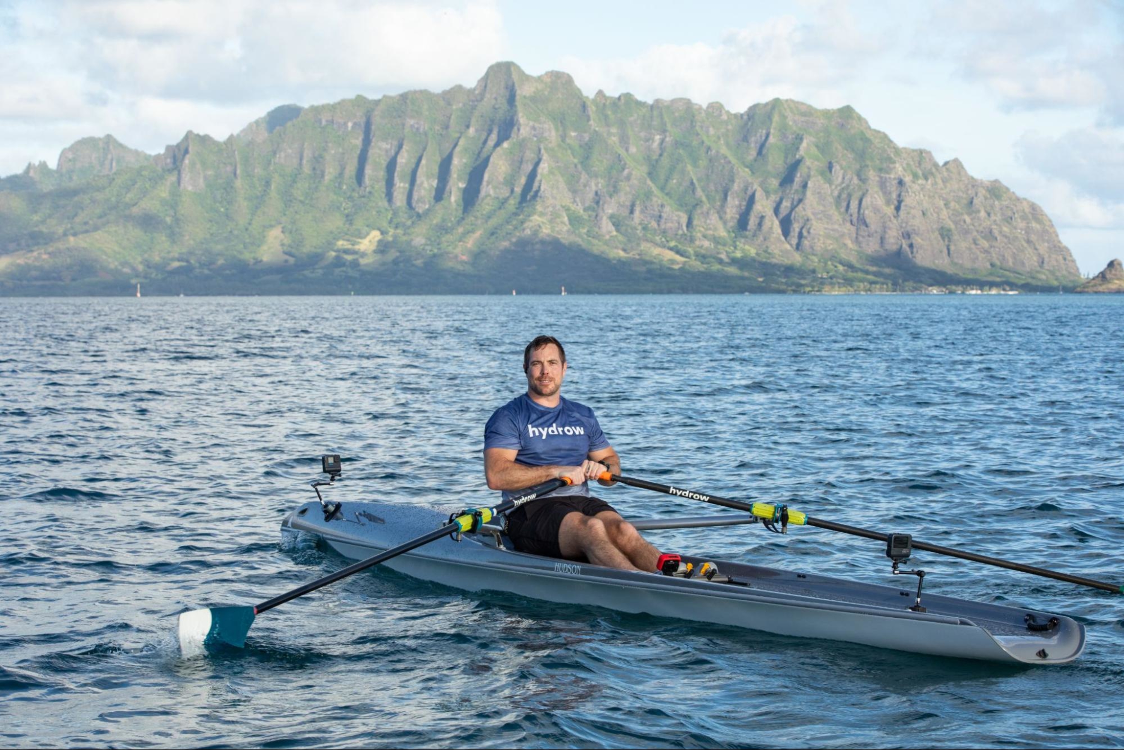 Hydrow Athlete James leads a rowing workout in Hawaii.