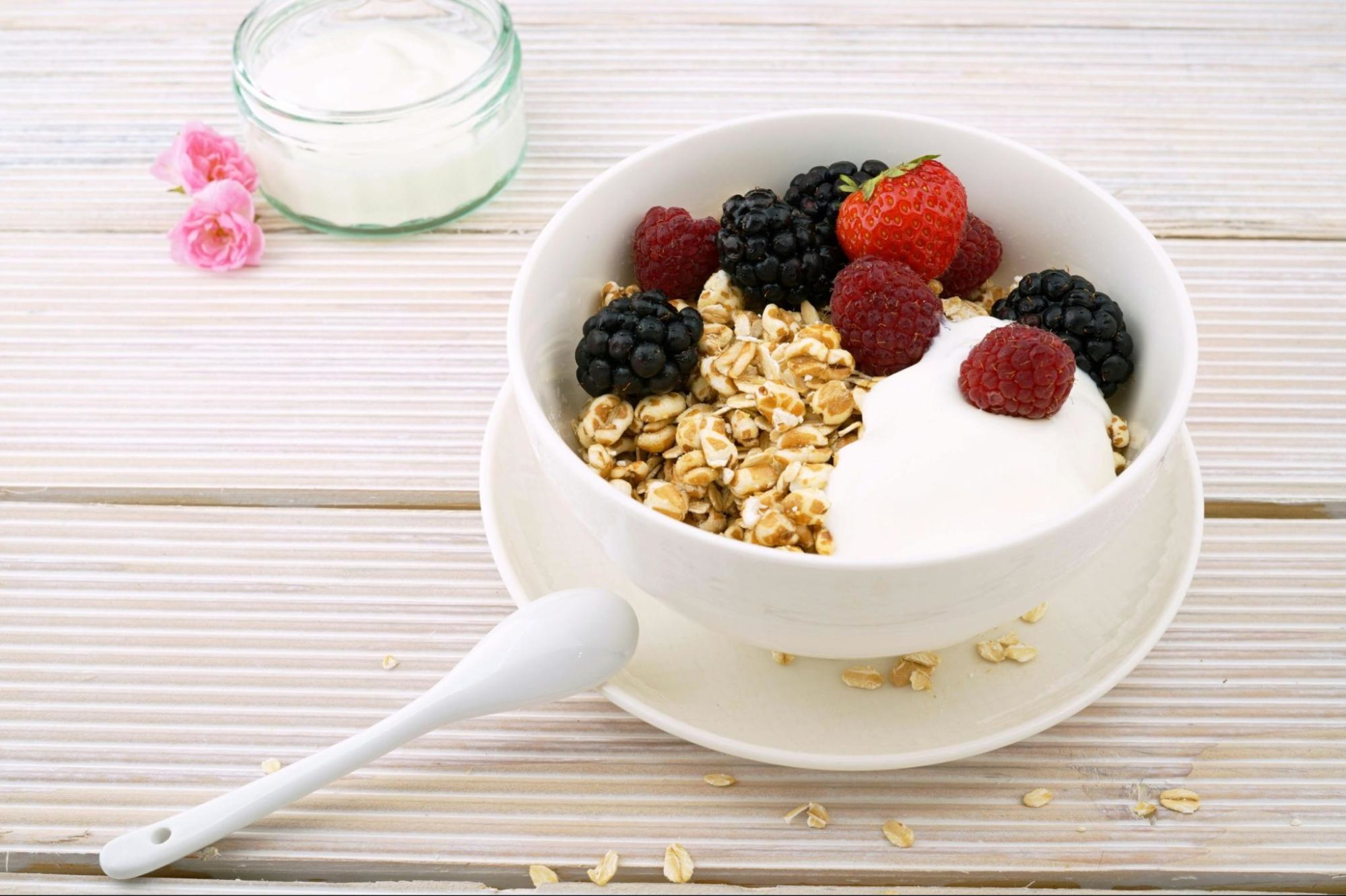 Yogurt with granola and berries to demonstrate a good way to get calcium and vitamin D as you age.