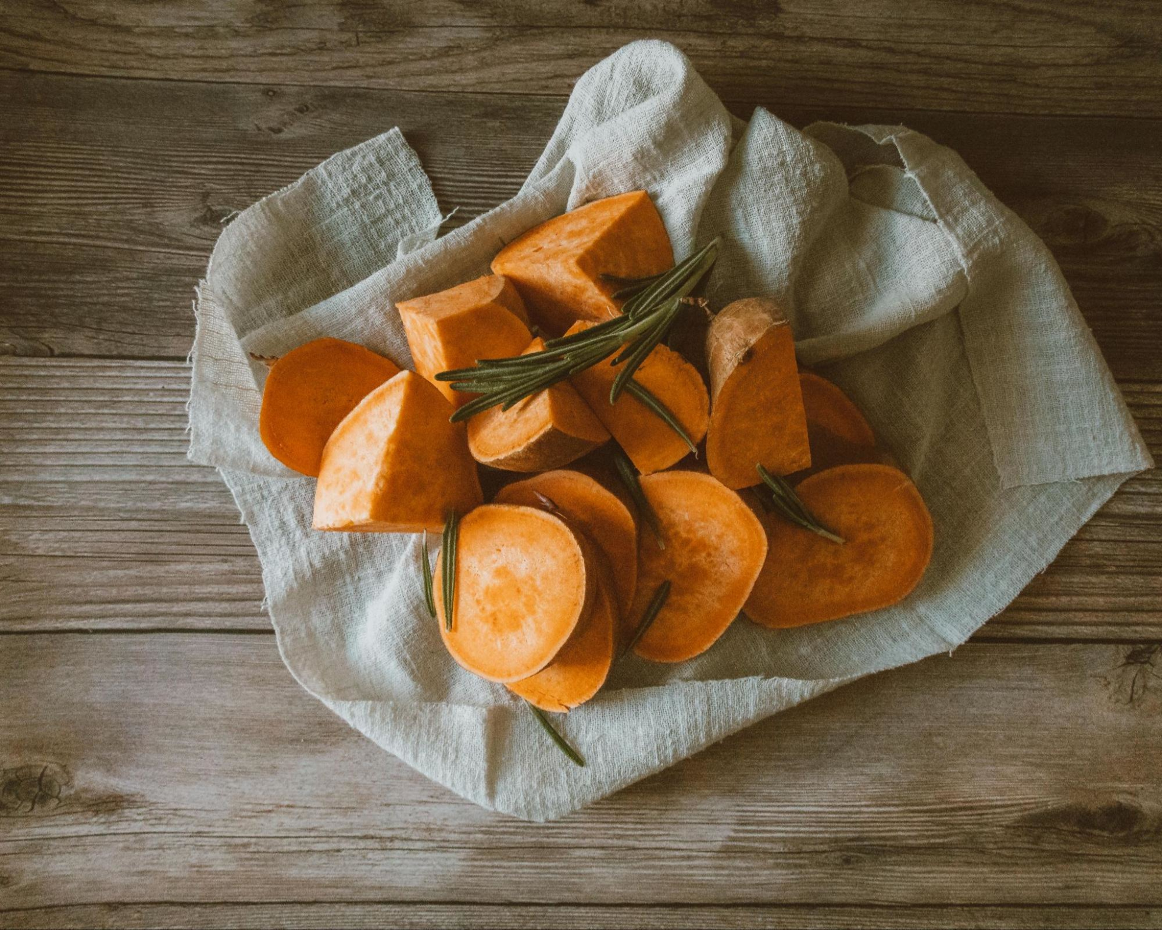 Sweet potatoes and rosemary to demonstrate healthy aging through focusing on your gut health and microbiome.