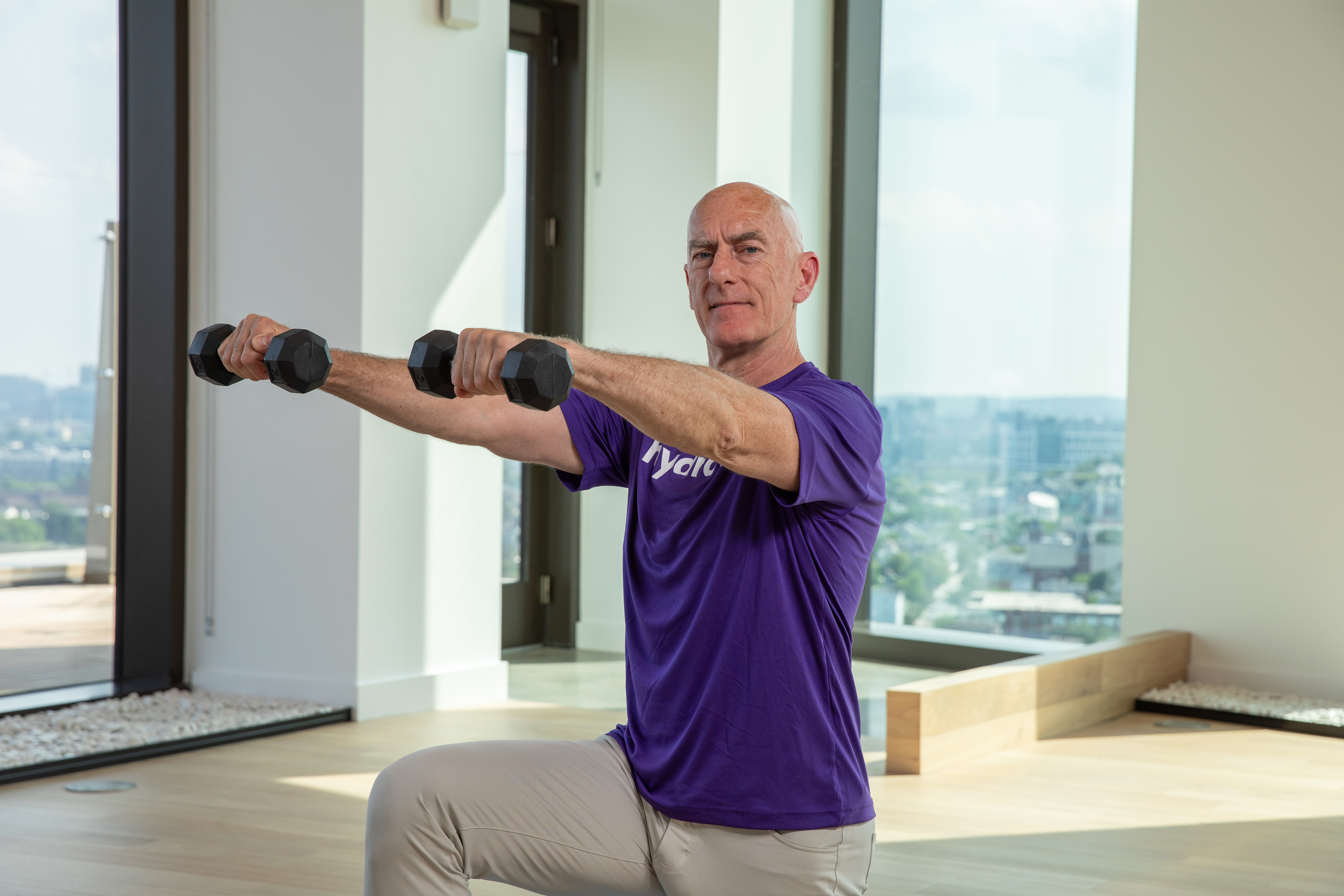Hydrow Athlete Pete leads a strength training workout.