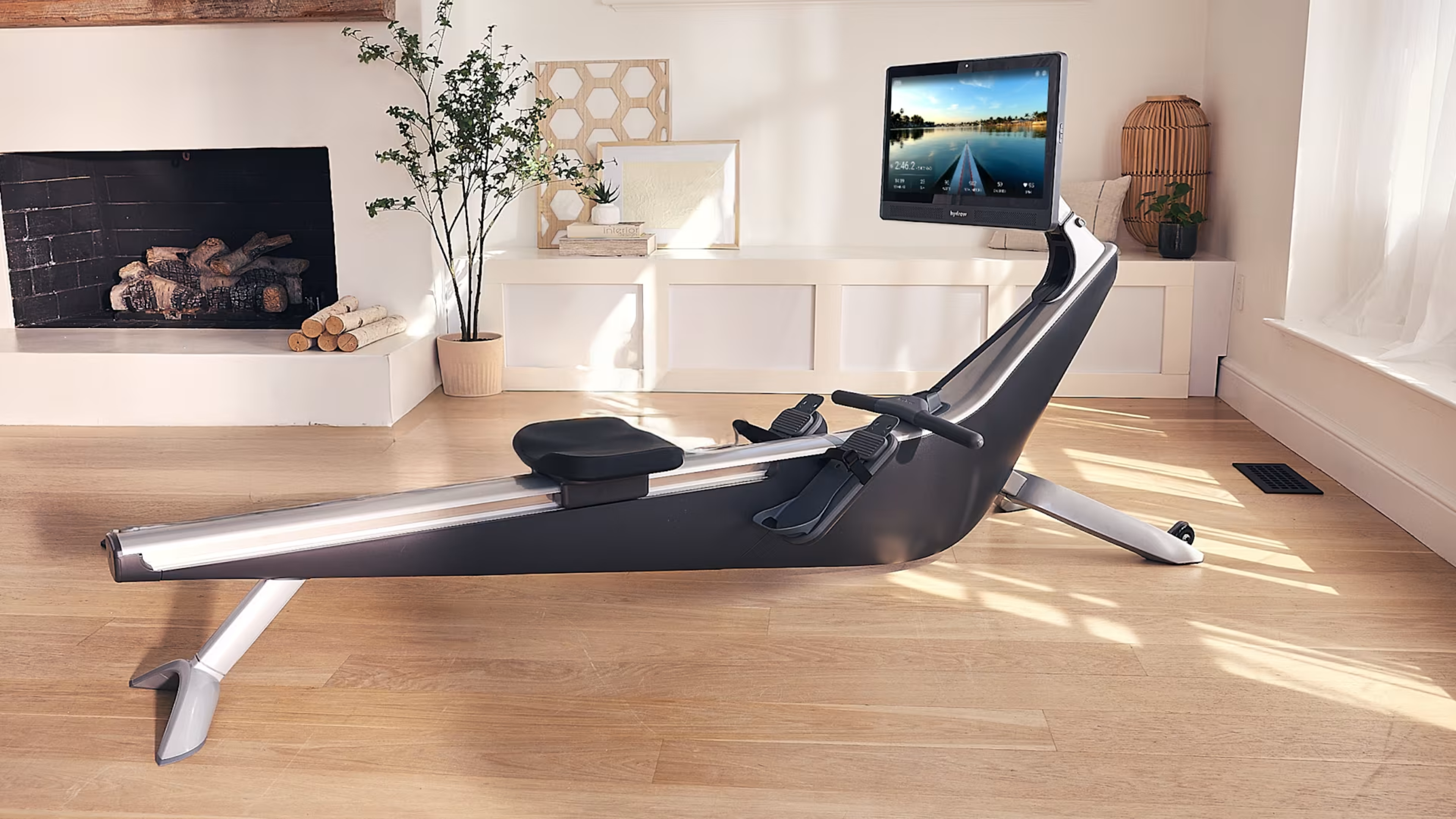 Hydrow Core rowing machine in a living room space.