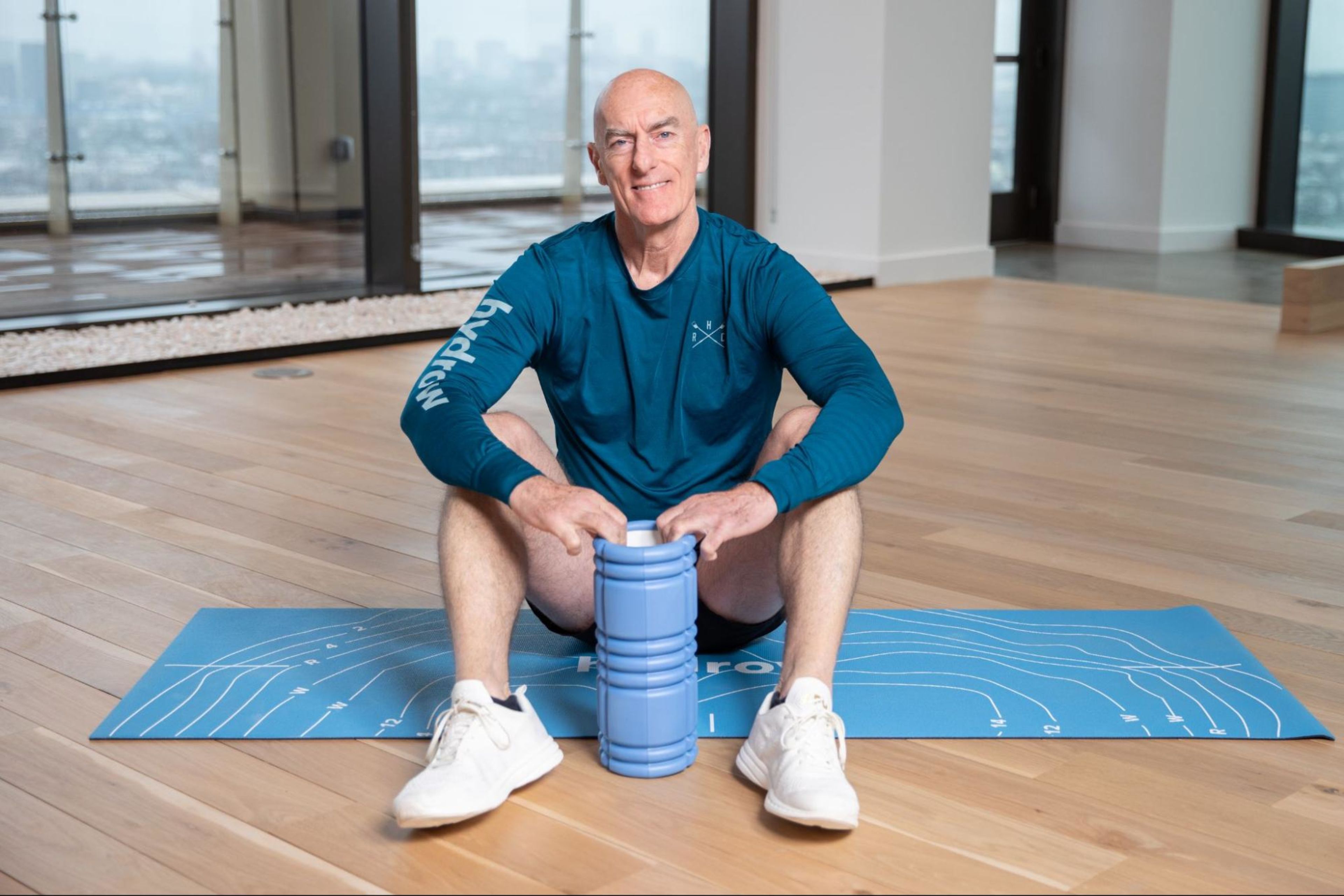 Hydrow Athlete Pete shows how to use a foam roller.