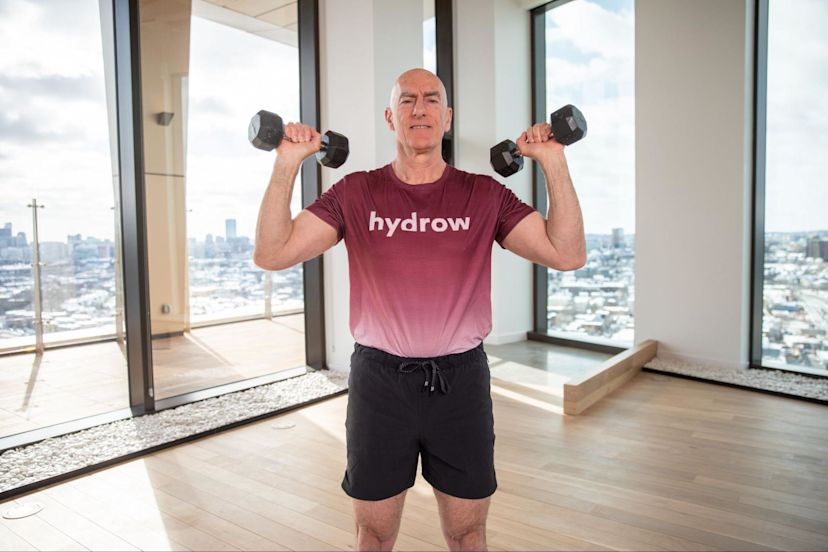 Hydrow Athlete Pete lifts weights to demonstrate how strength training can lower blood pressure.