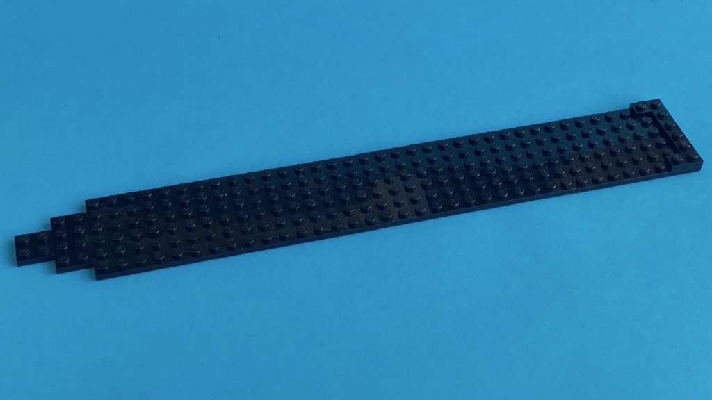 Step 1, the bottom of the ship built with black plates