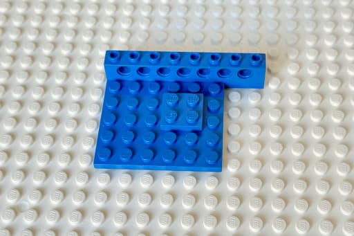 The first technic brick in place on the right side