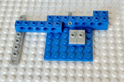 The base for the seat and the right side extension to the front wheels added