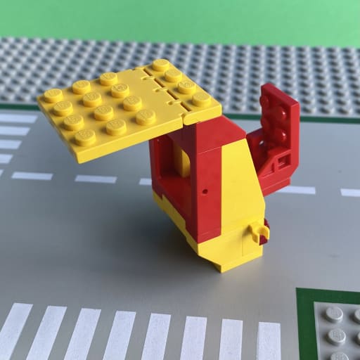 The hopper with rear loader