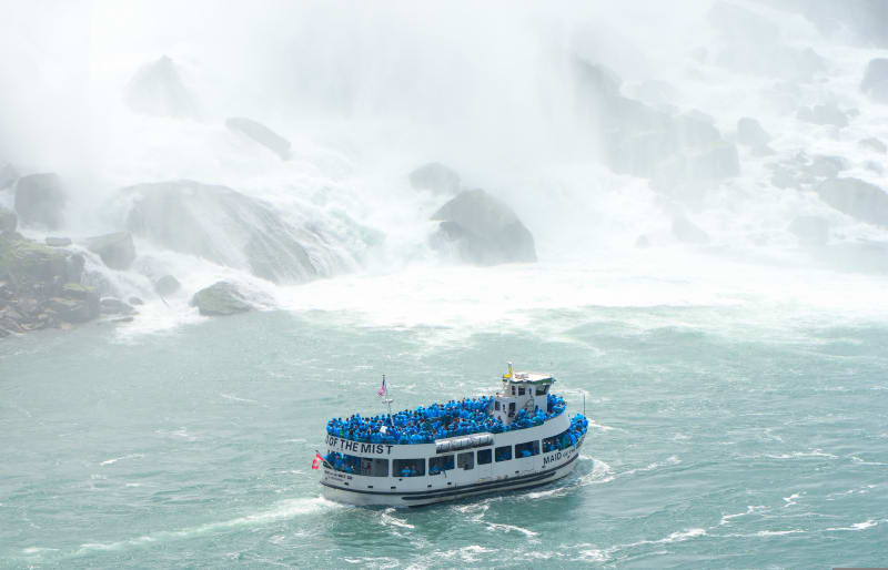Maid of the Mist boat in the spray below Niagara Falls