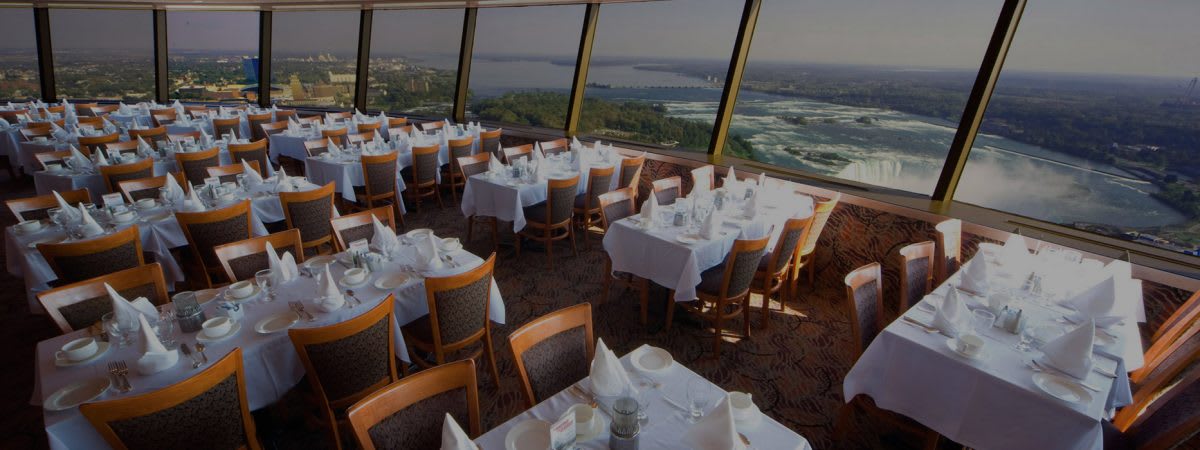Summit Suite buffet dining room inside the Skylon Tower with falls views