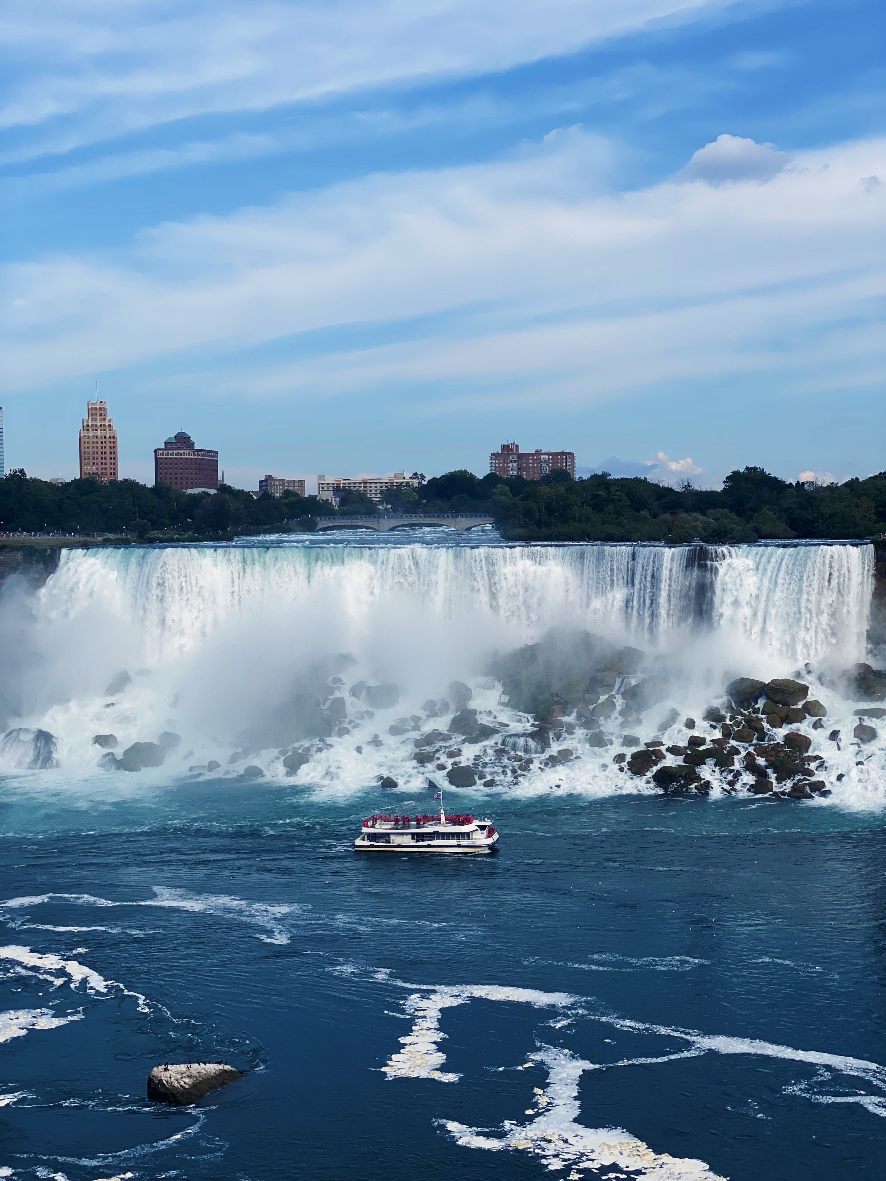 Niagara City Cruises boat sailing into the Horseshoe Falls basin