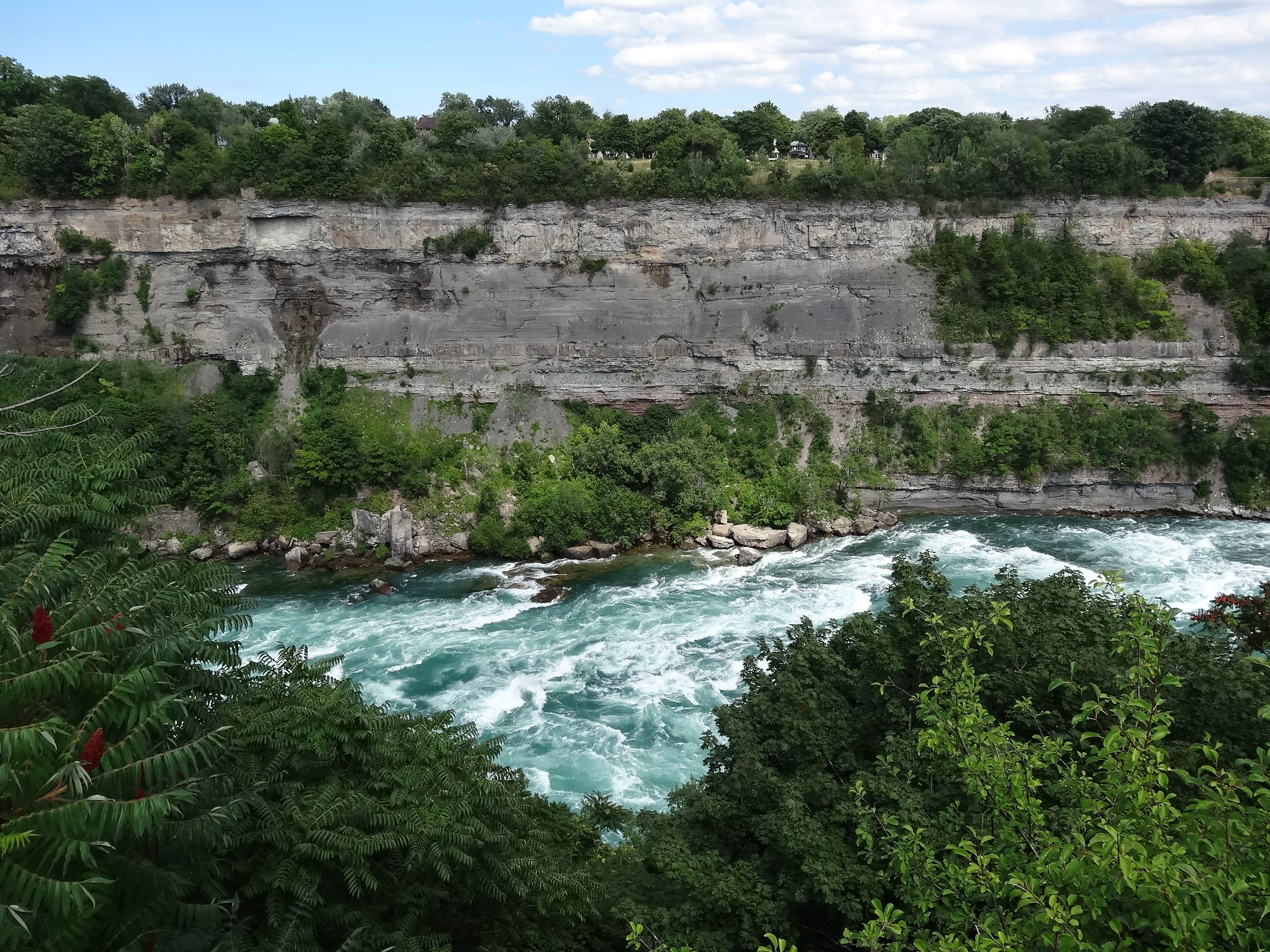 Whitewater rapids running through the Niagara Gorge