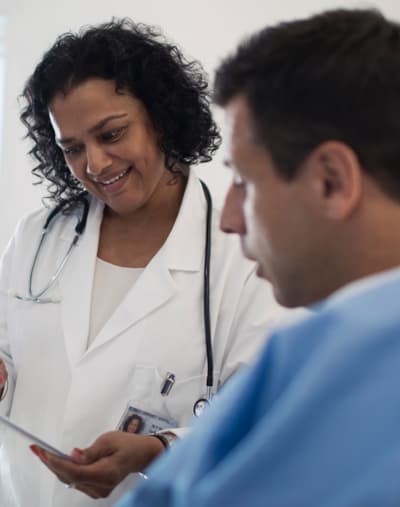 Two doctors reviewing a file