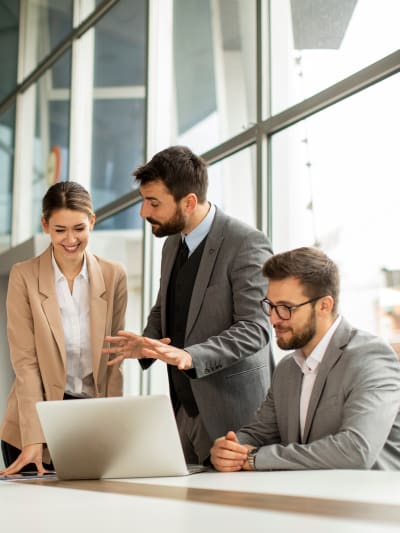 Group of working adults having discussion 