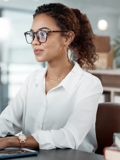 woman looking at a computer