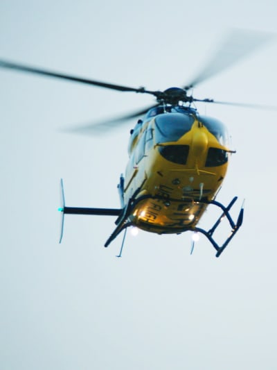 Yellow and blue medical helicopter