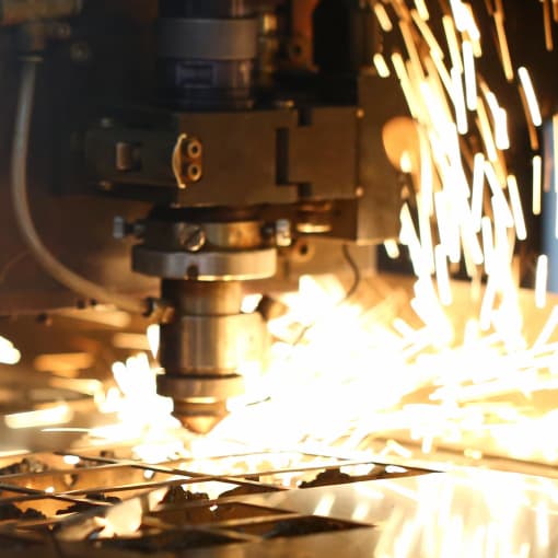 Manufacturing machinery with sparks.