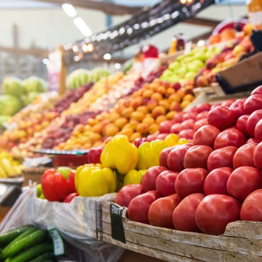 Photo of fresh vegetables available for purchase at a supermarket. 