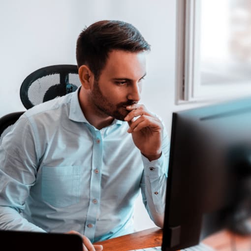 man staring at the computer screen