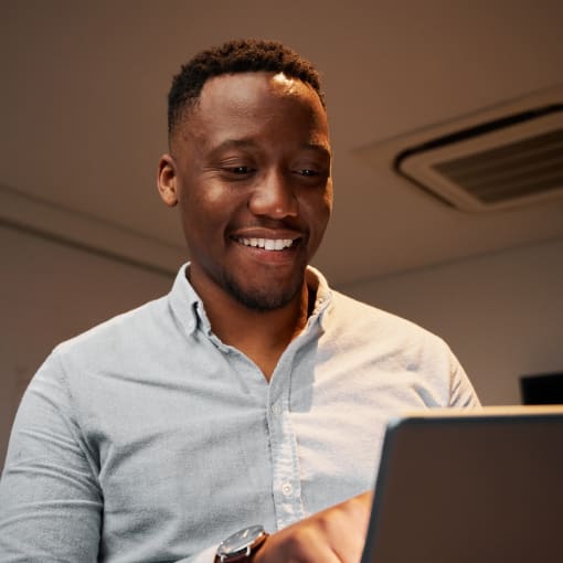 A person seeking a content services platform reads an analyst report on a tablet.